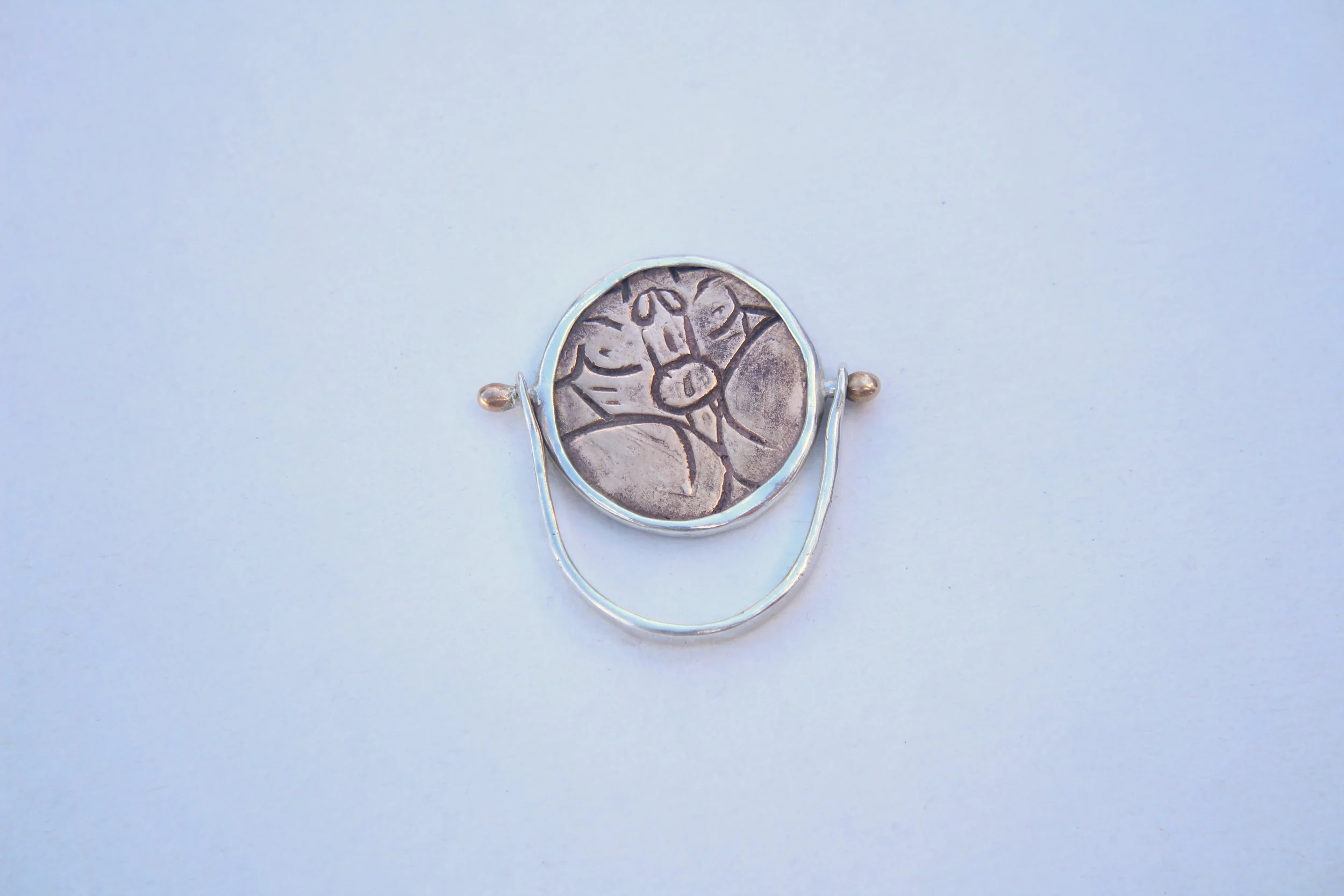 TrevorMock_Tainted_RingFront - Trevor Mock.JPG