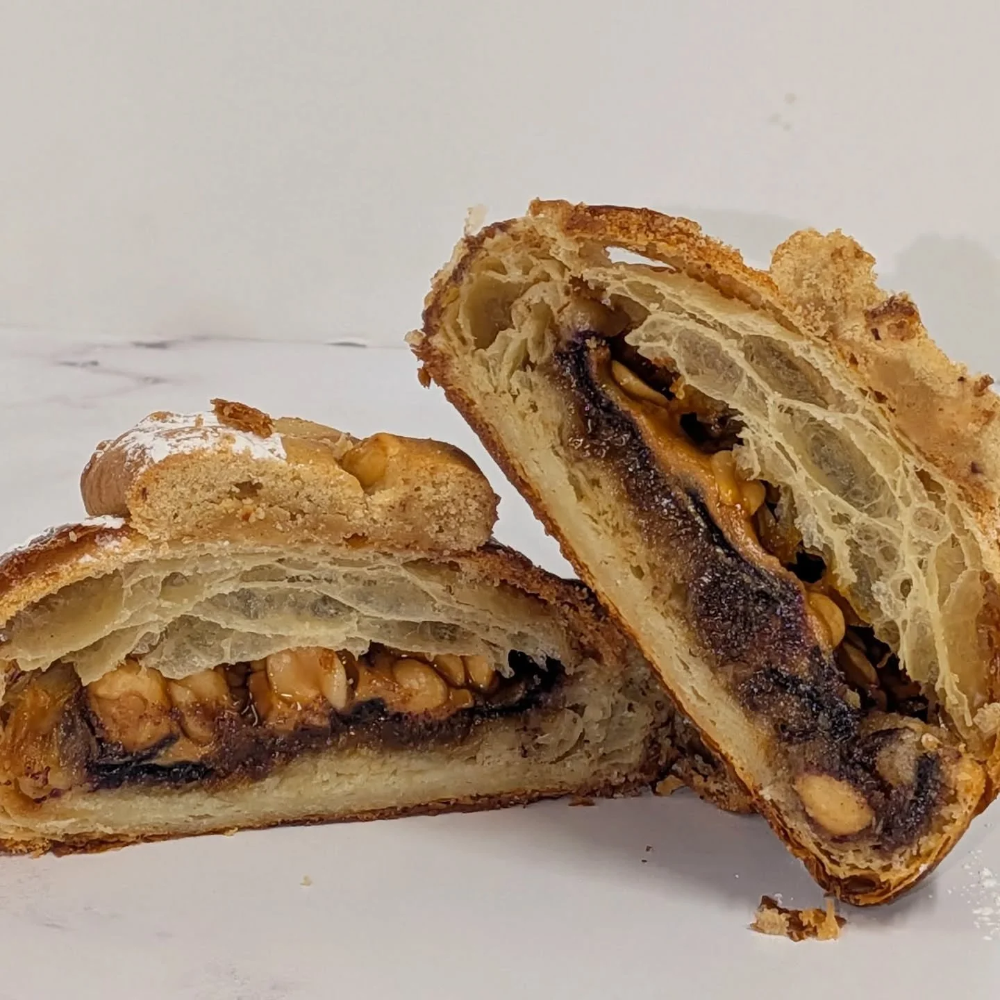 PEANUT BUTTER BLUEBERRY CROISSANT 

peanut butter, blueberry gel, coffee almond cream, peanut pieces, and a peanut butter cookie on top. It's elevated classic flavors we all know and love. 

📍Available only on Jan 30th at all Labs locations 

you kn