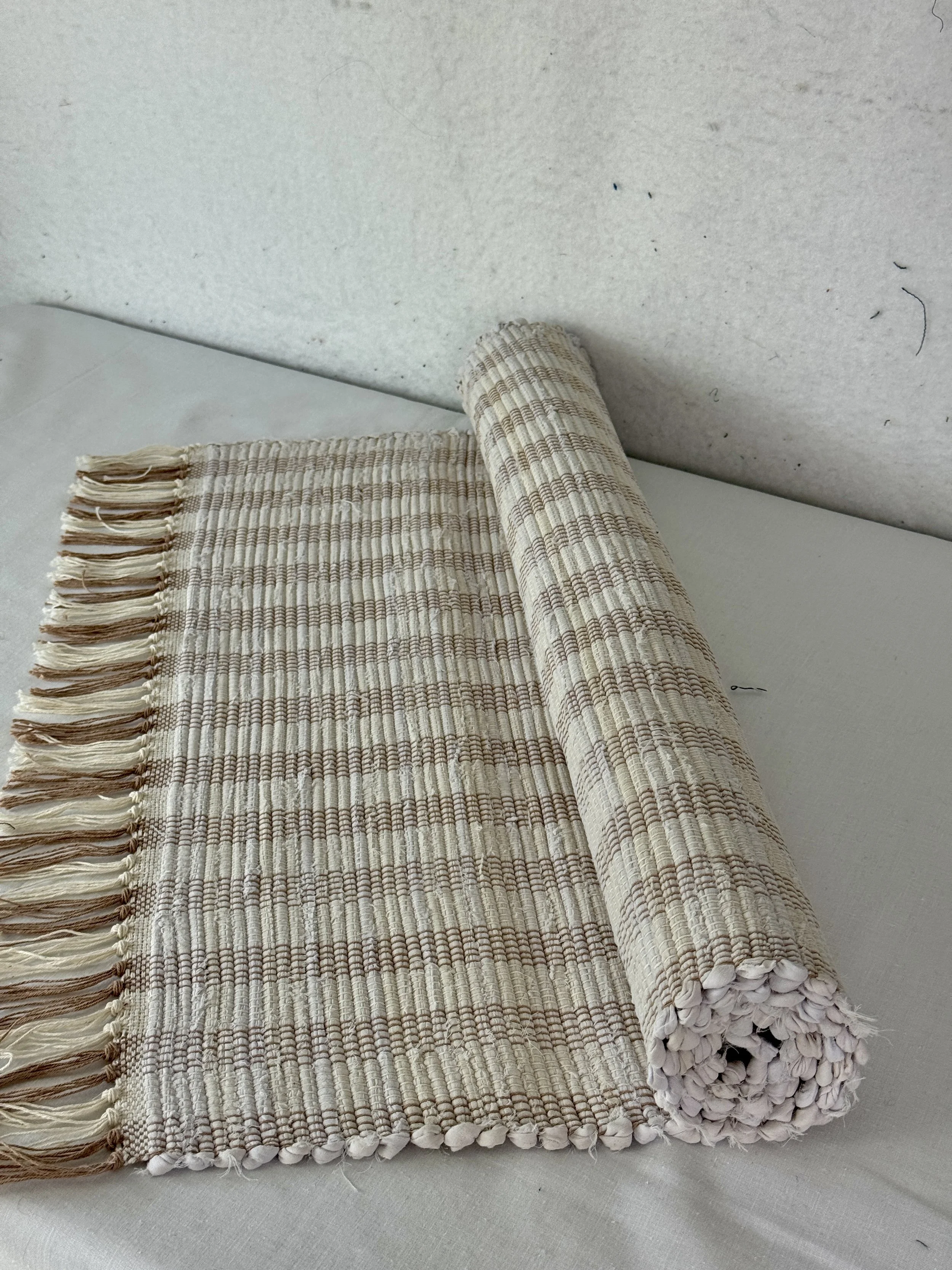 Handwoven cream rag rug 25 x 51 woven with upcycled textiles