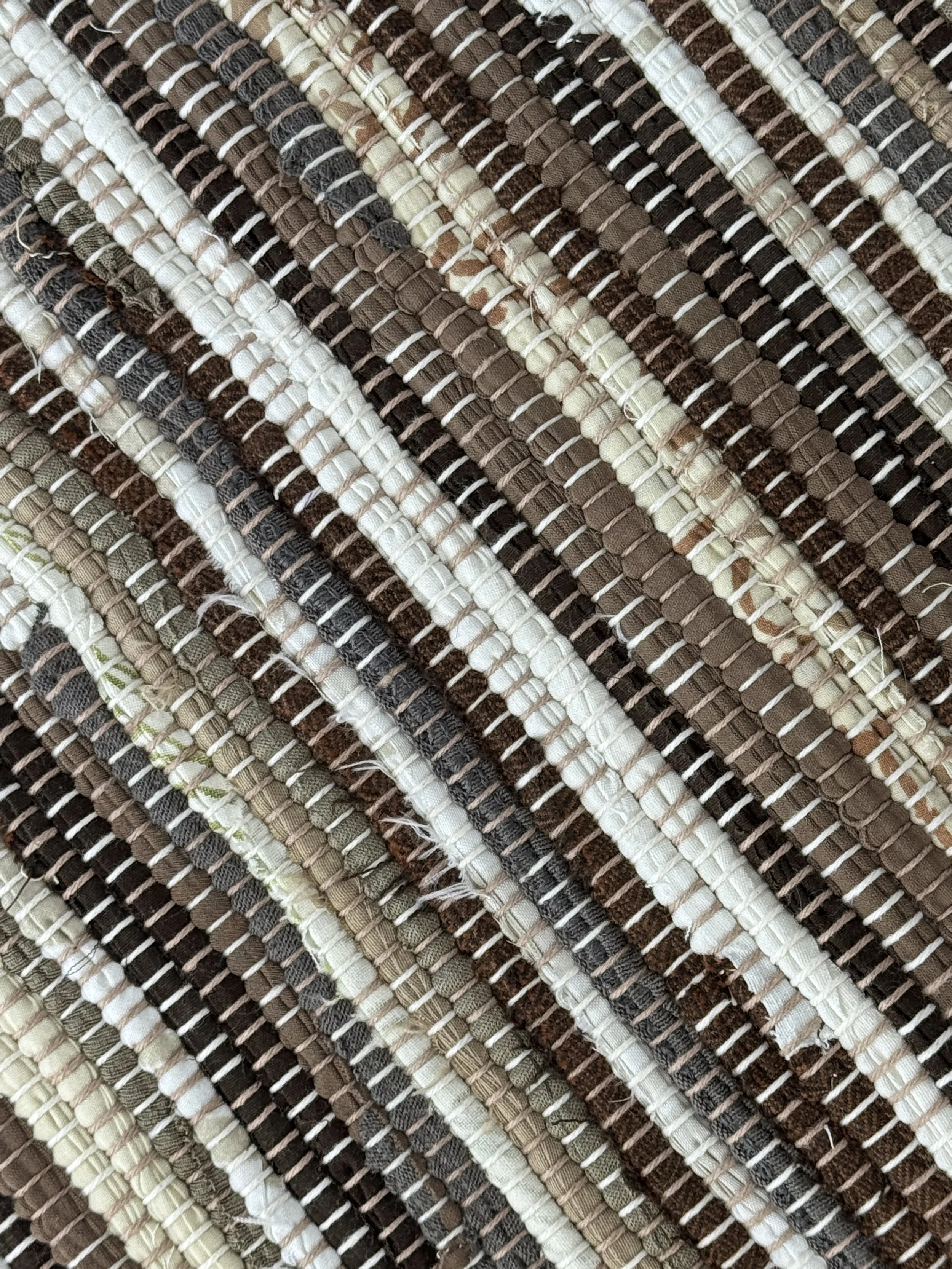 handwoven rag rug up-close featuring weave and texture