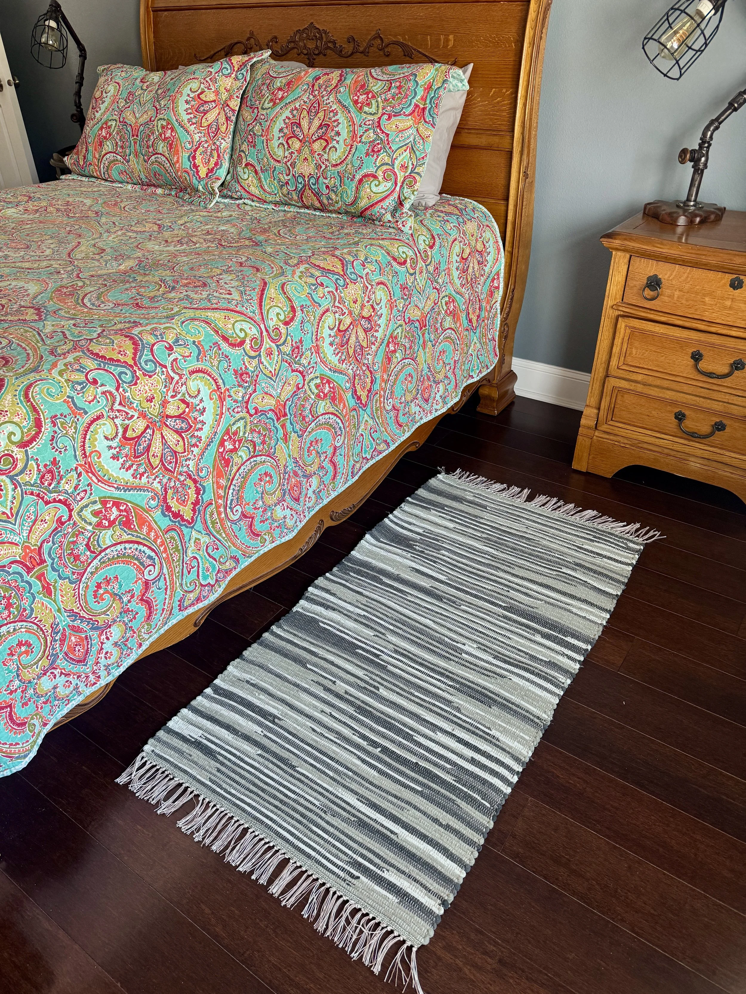 Displayed handmade rag rug in bedroom