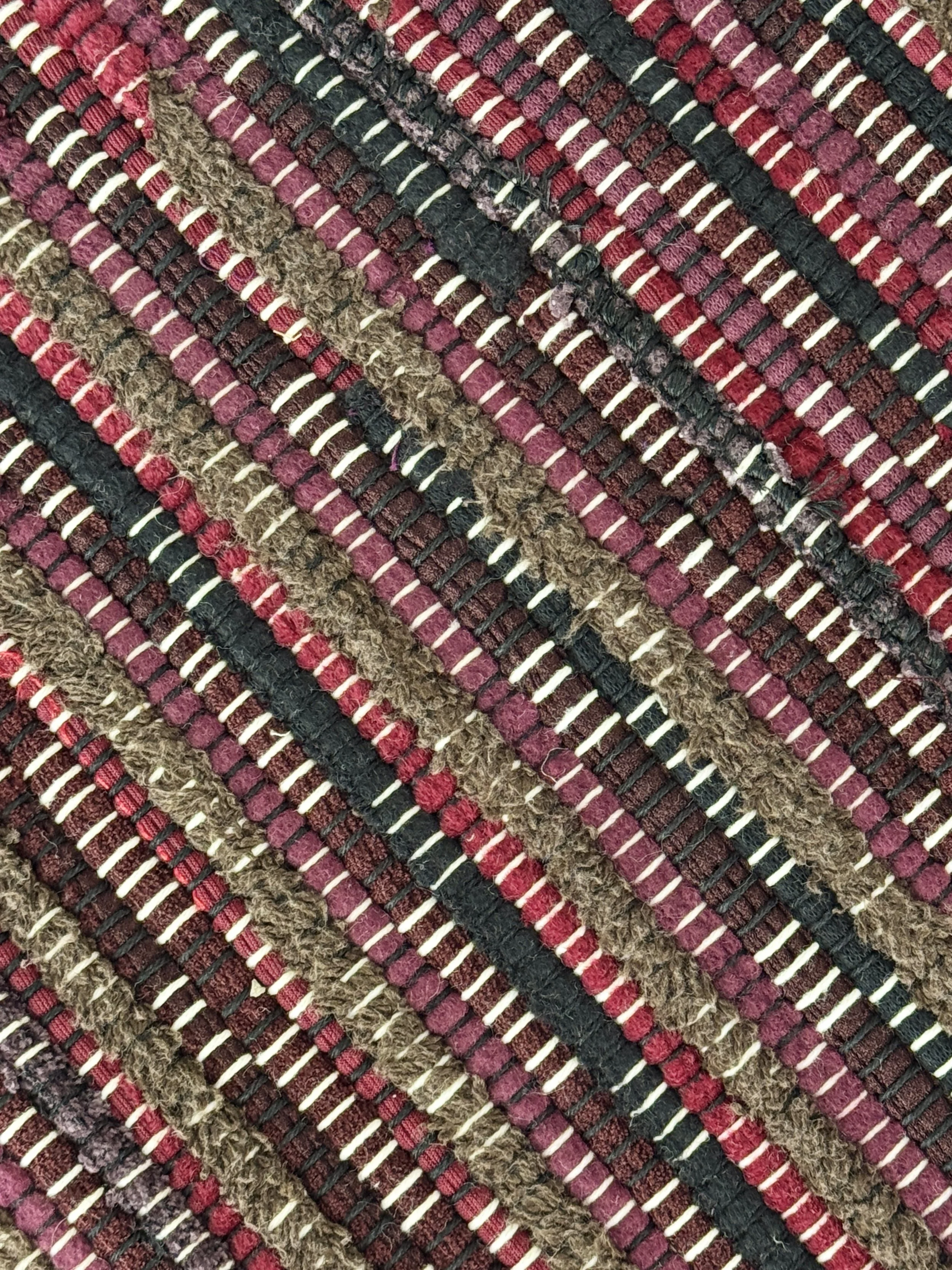 Close-up handwoven rug showing texture and pattern