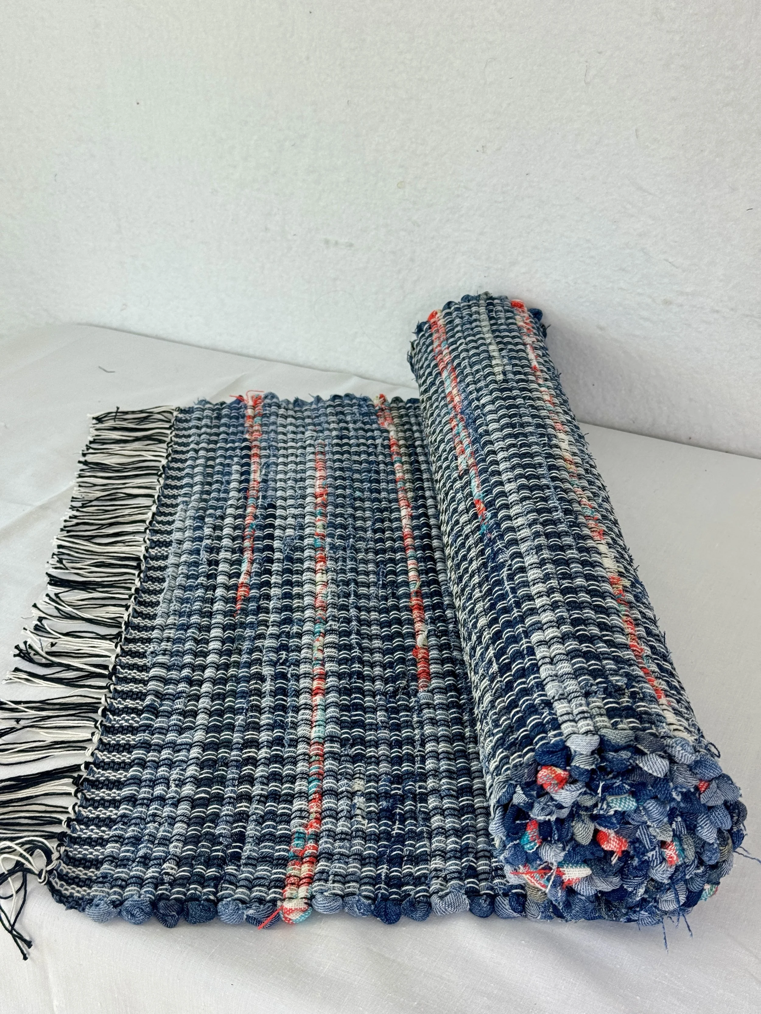 Handwoven denim rug made from recycled blue jeans