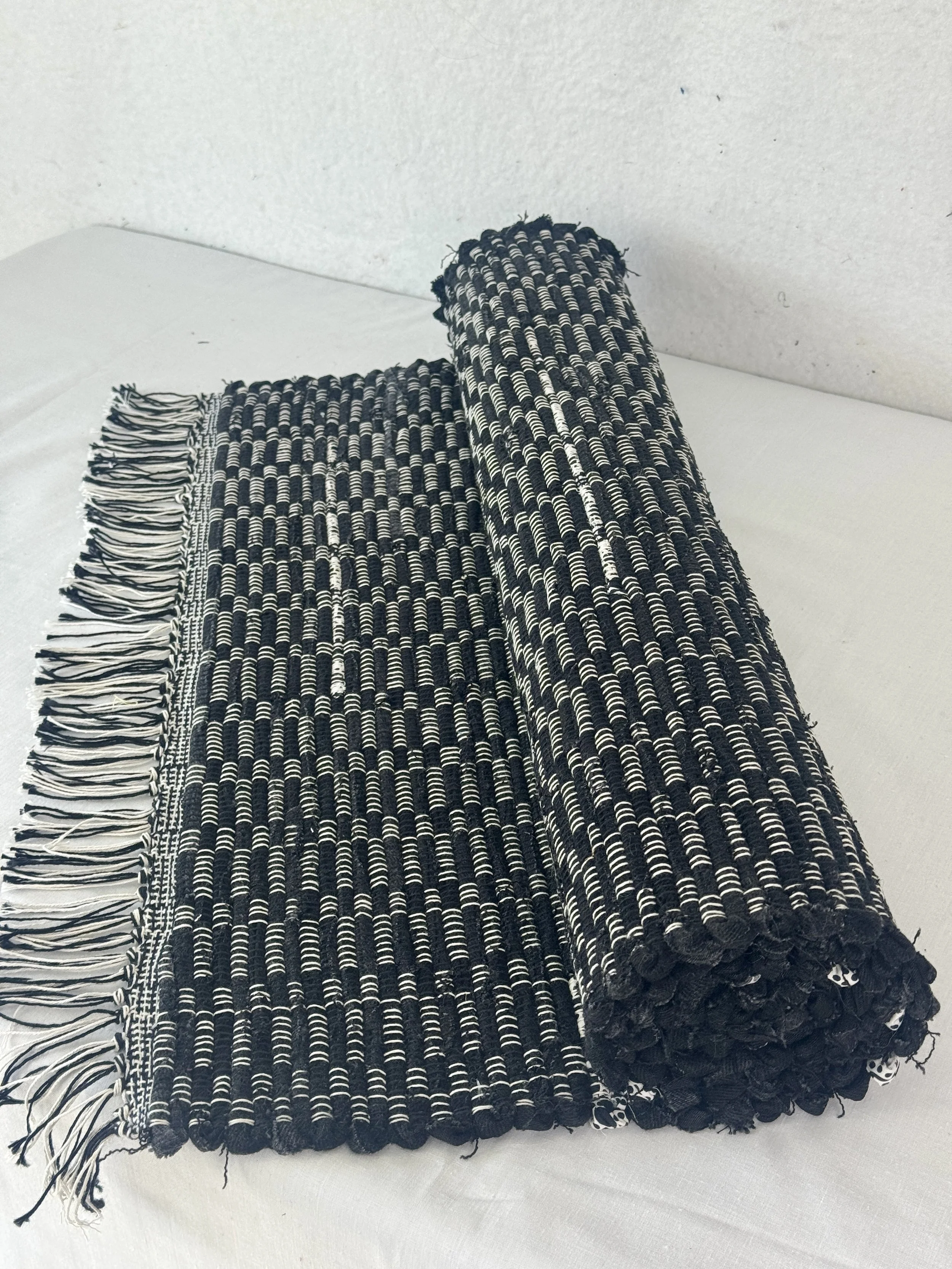Handwoven black rag rug 25 x 68 made from recycled textiles