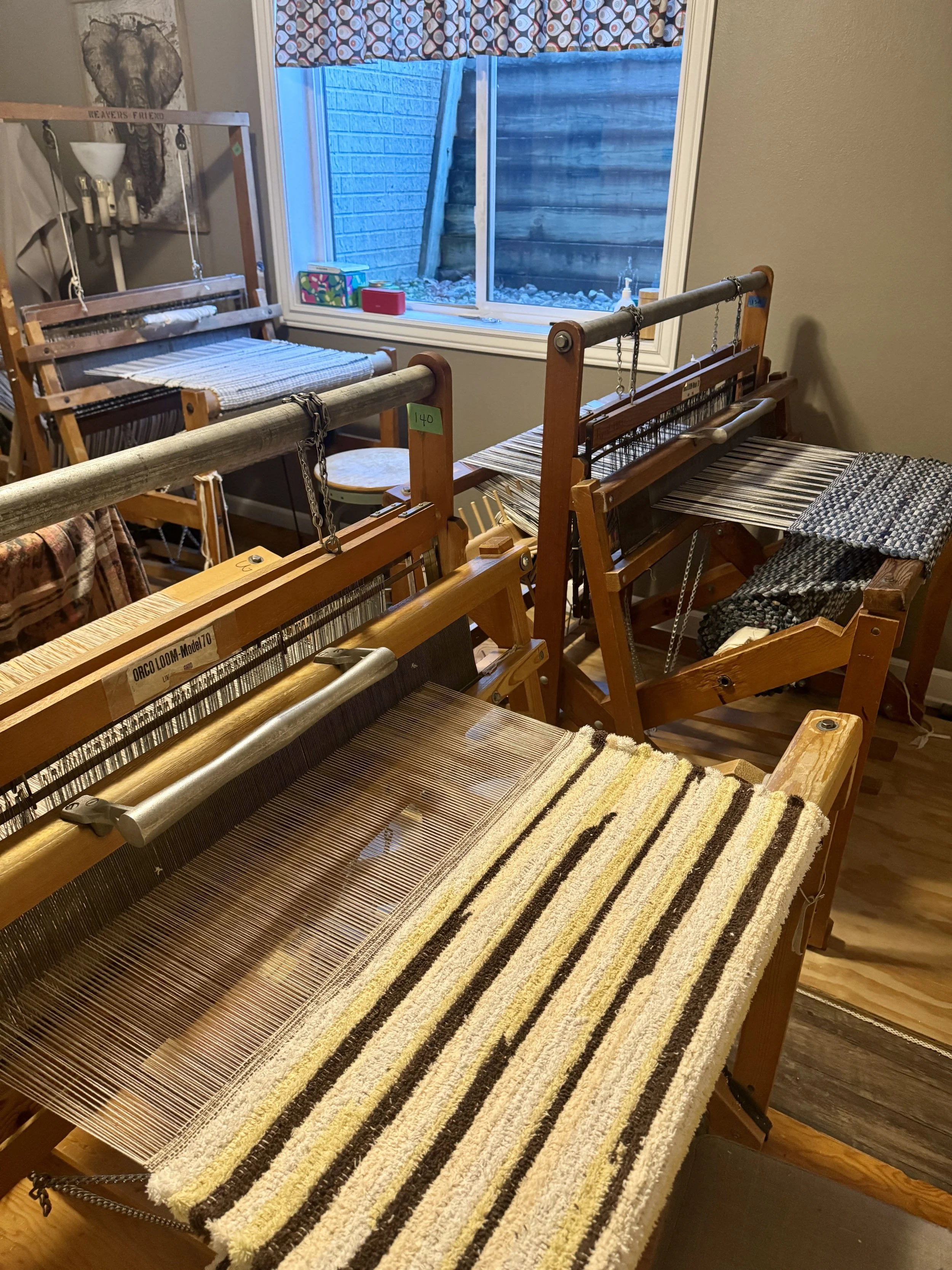 Wooden loom used to weave handmade recycled cotton blend rag rugs