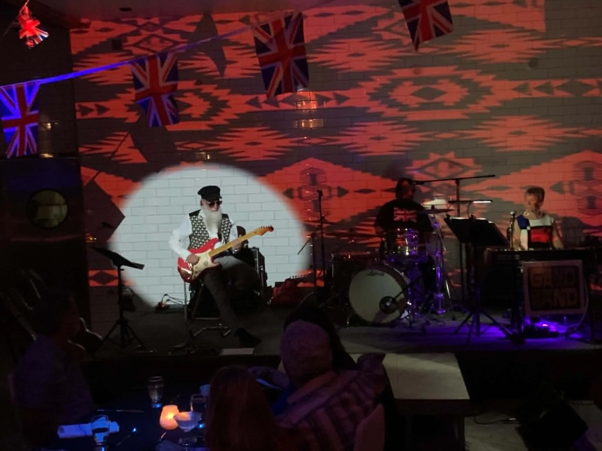 Live musicians and themed projection mapping transform the stage into an unforgettable evening of music, dining, and entertainment.