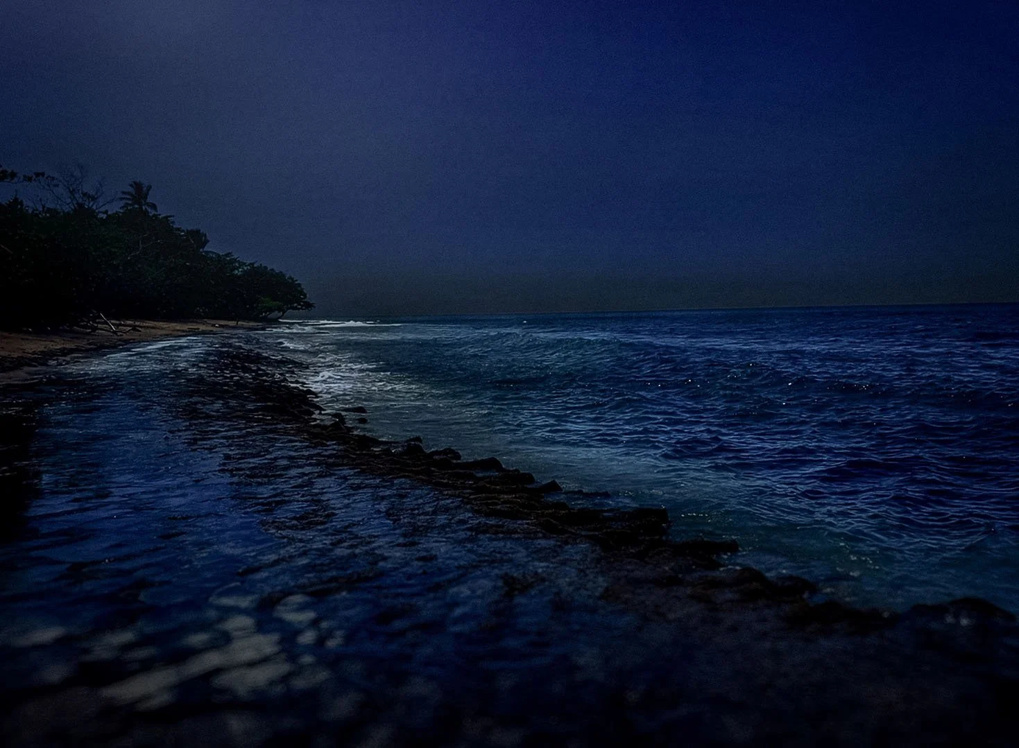 Tres Palmas Marine Reserve, shown at nighttime, is a popular beach for snorkeling and scuba diving