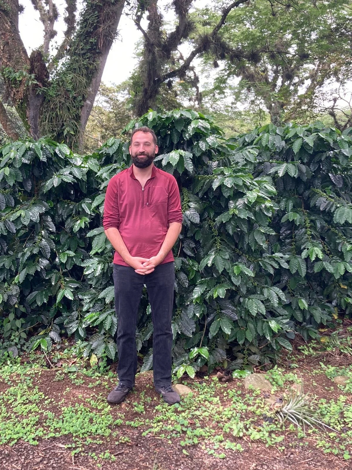 Kevin Lenahan visiting a coffee plantation to evaluate opportunities.