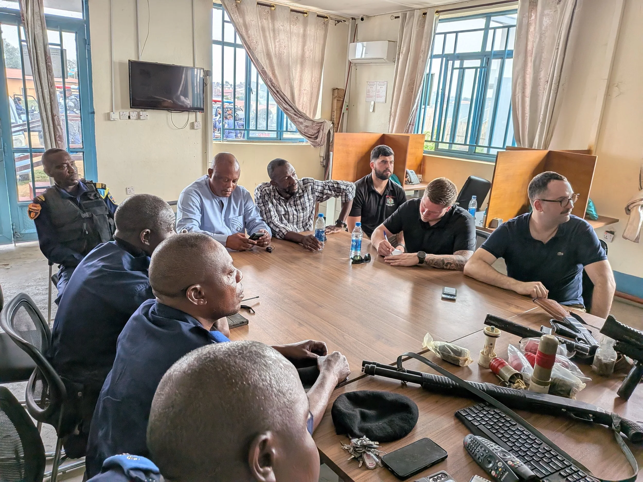 Kevin Lenahan in a collaborative meeting with the DRC national police, the PNC, on community-oriented policing.