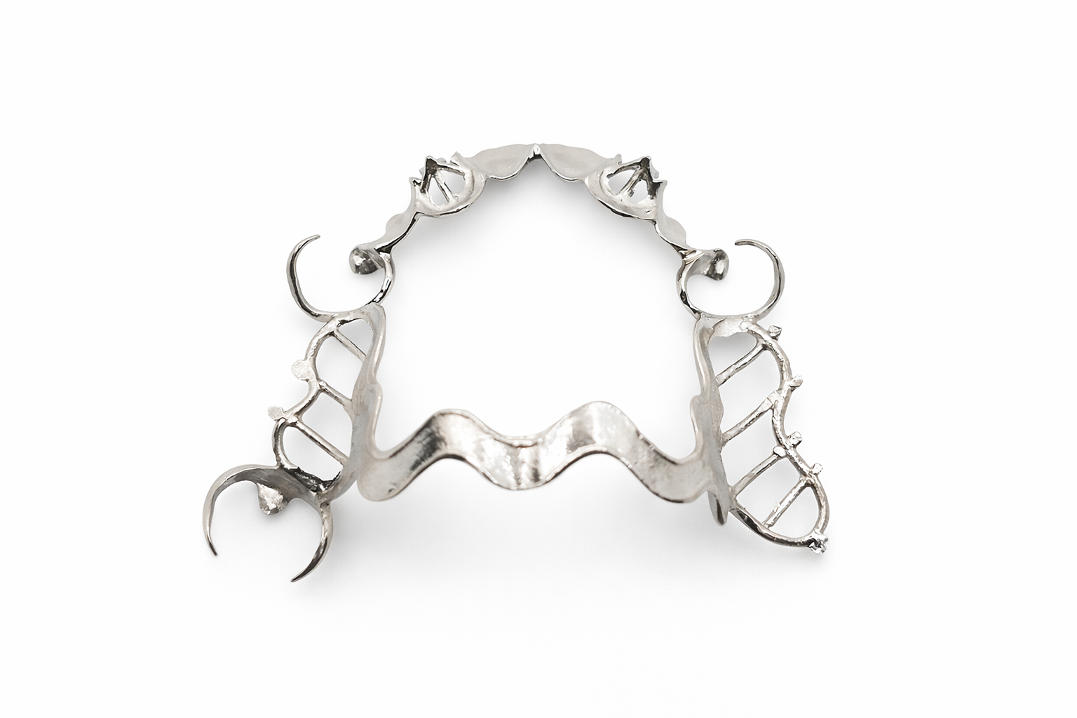 Silver ring with a design resembling a DNA double helix and moon phase symbols, isolated on a white background.