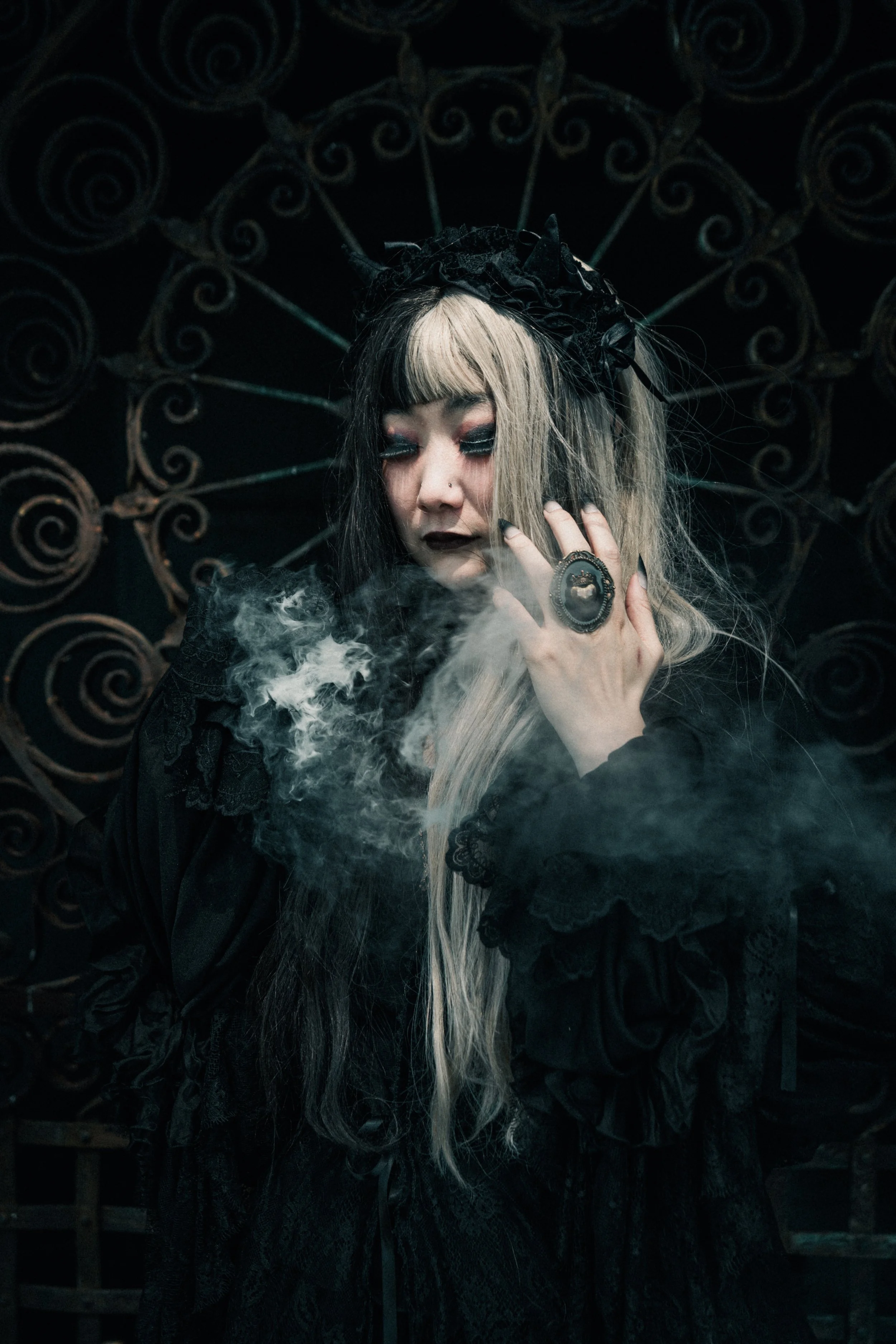 @obsixwi in a prototype blouse and 'Diaboli' headdress. Photo by @bon.komera