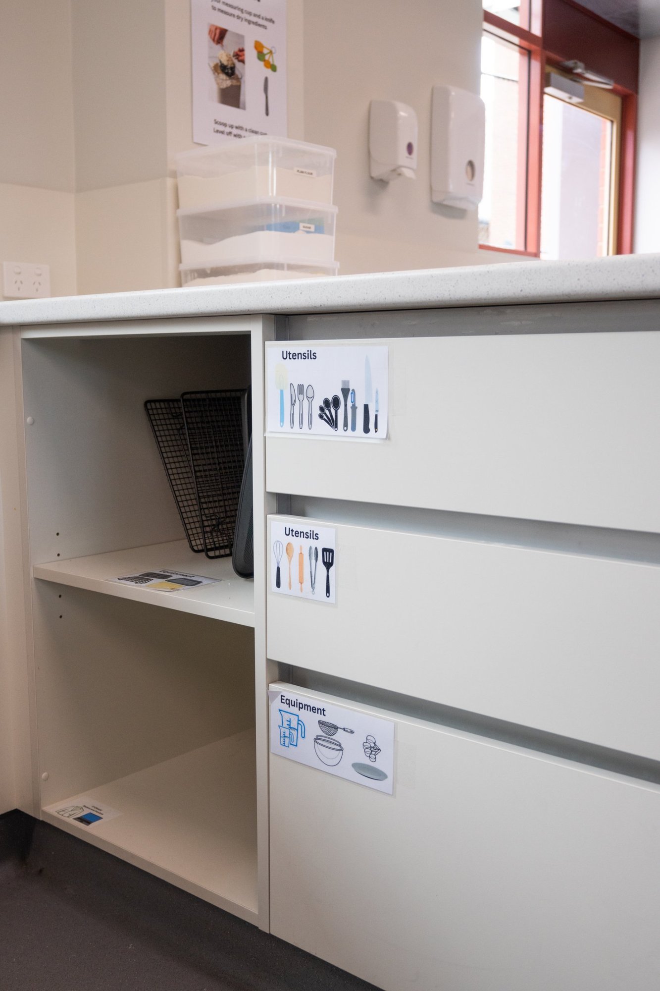 StPatricksCollege-KitchenClassroom-06-labelled-drawers-detail.jpg