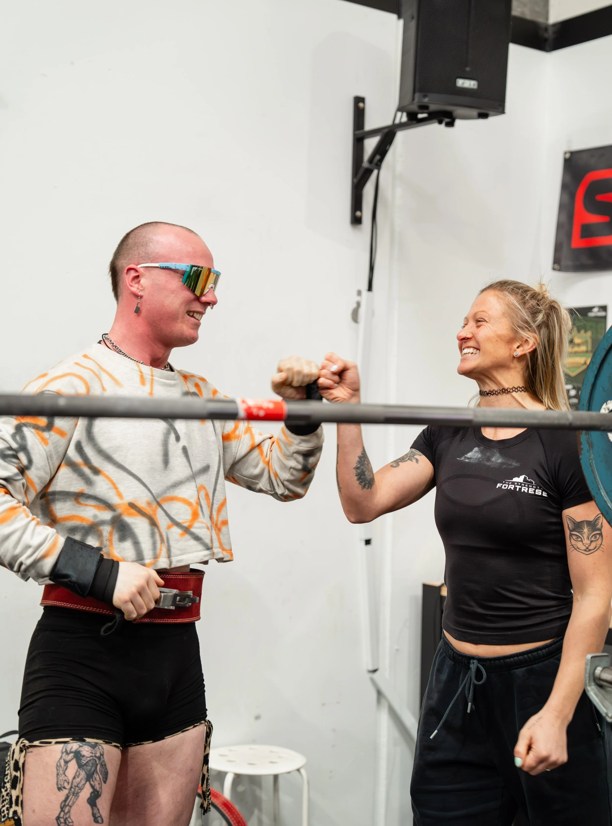 Billie fist bumps Gia after a successful squat attempt