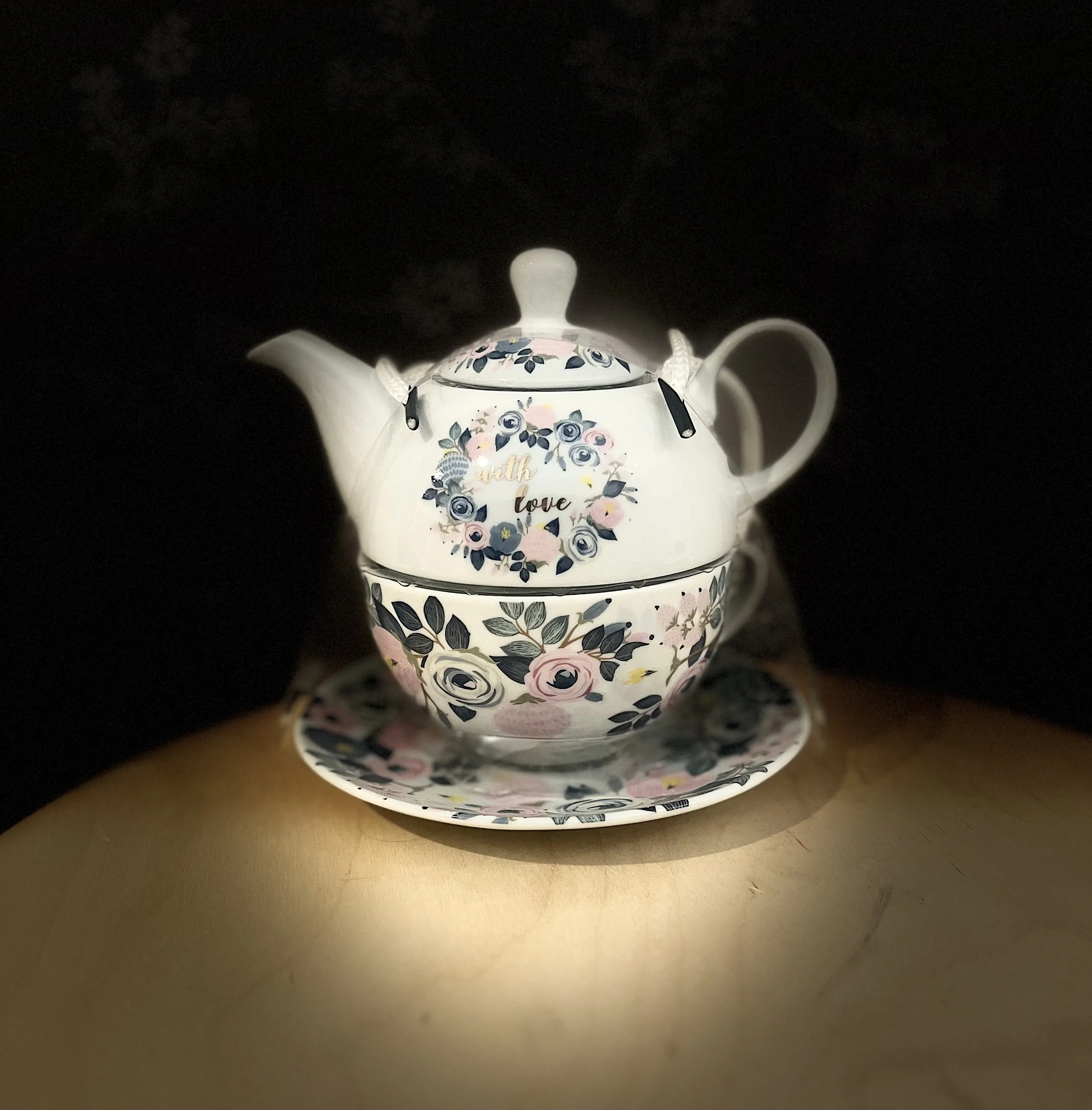 Porcelain teapot, cup and saucer set