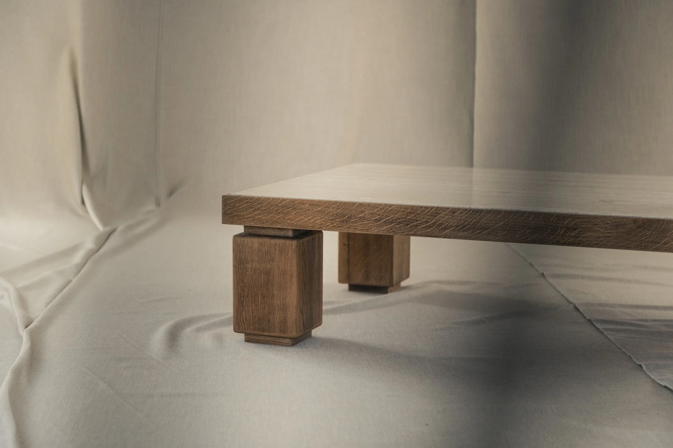Large solid oak and travertine coffee table — (RE)APPROVED