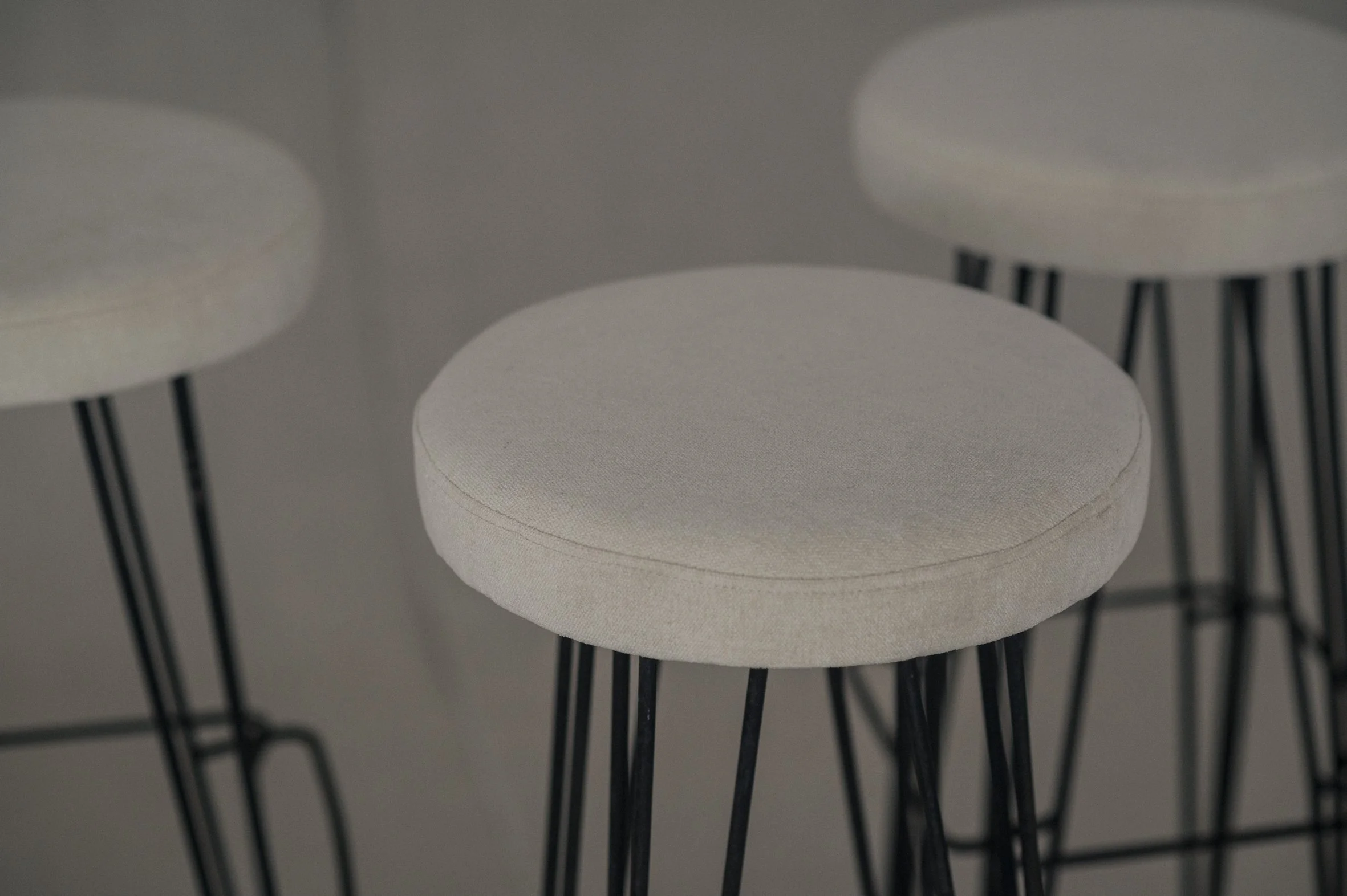 Image showcasing Set of three minimalist bar stools — (RE)APPROVED