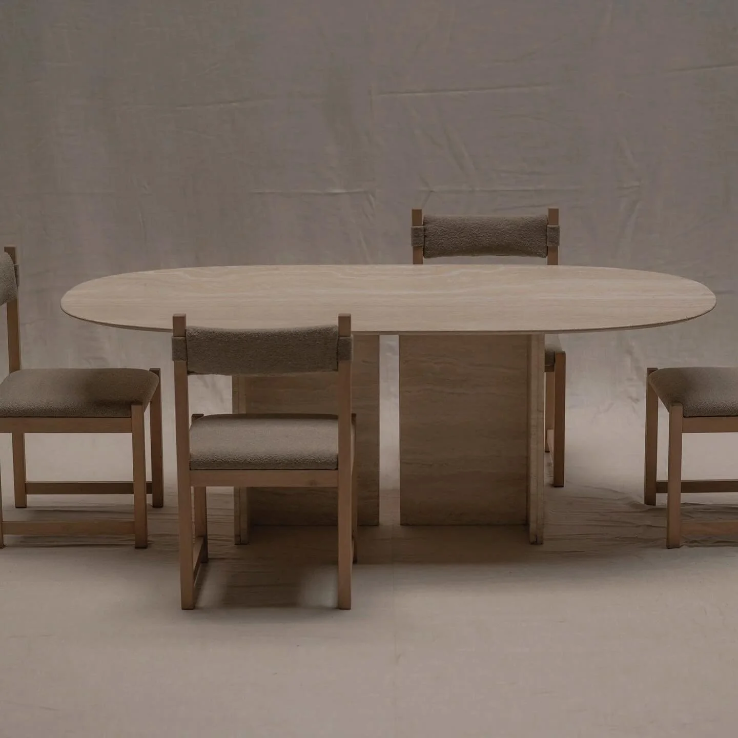 FOR SALE - A striking 1970s Italian dining table crafted in solid travertine with an elegant oval top. The architectural base provides balance and presence, while the faceted border around the tabletop enhances its refinement, making the stone appear