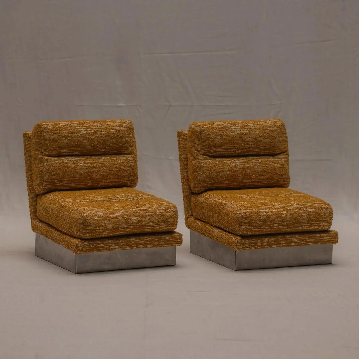 FOR SALE - A rare and iconic set of &lsquo;two California&rsquo; easy chairs, designed by Jacques Charpentier in the 1970s. Recently re-upholstered in a luxurious French jacquard textile, the chairs balance comfort with striking design.

The timeless