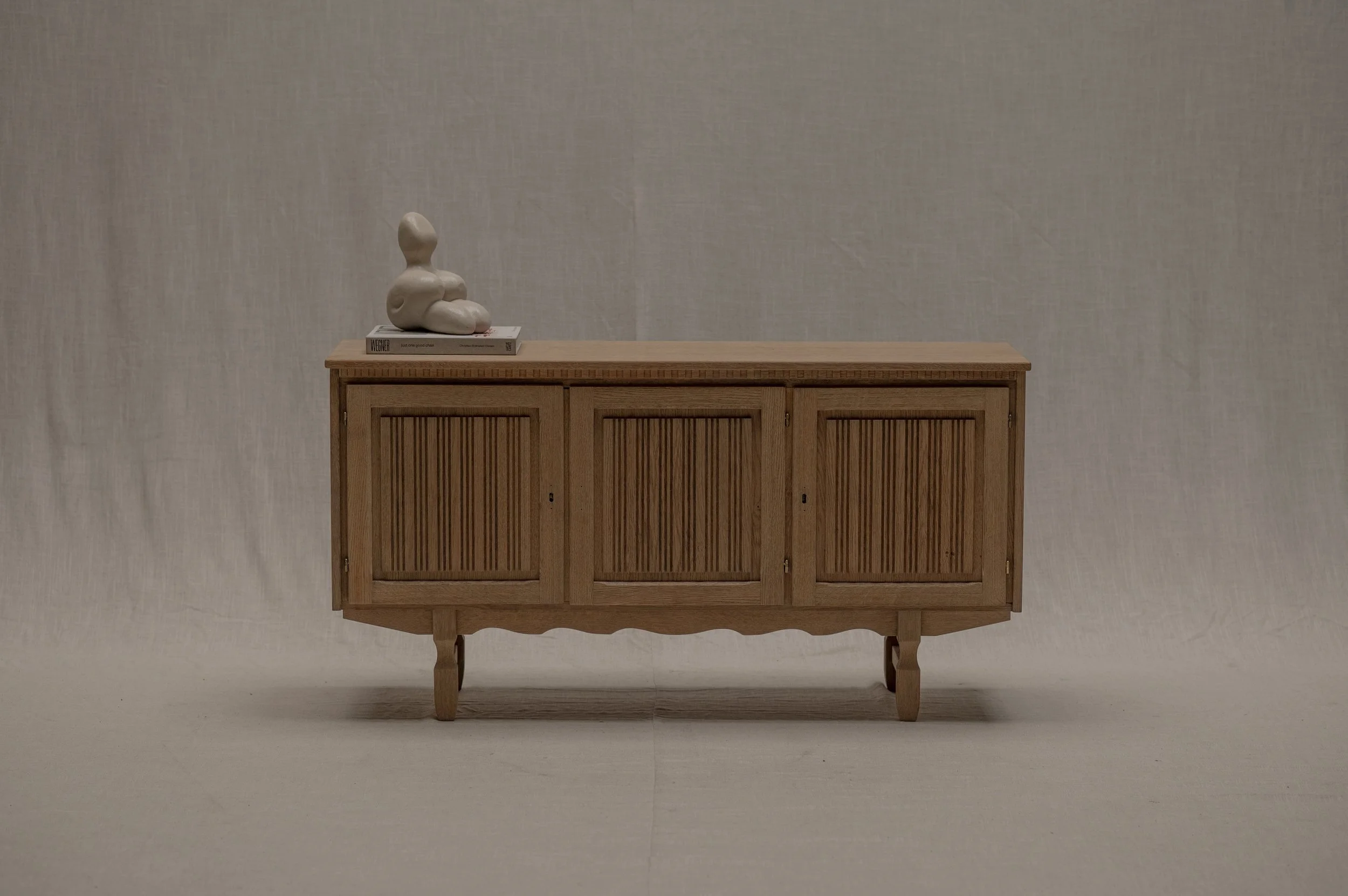 Danish sideboard by Henning Kjærnulf in solid oak, 1960s