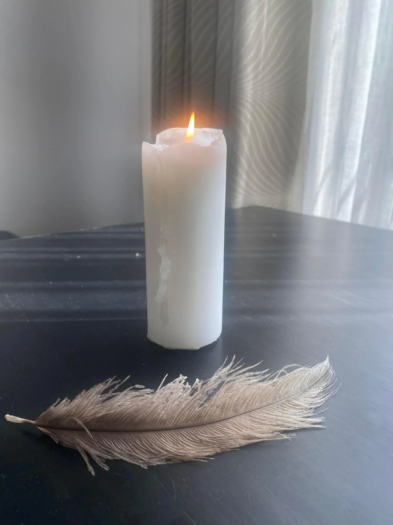 ‘Light a candle’, she said.