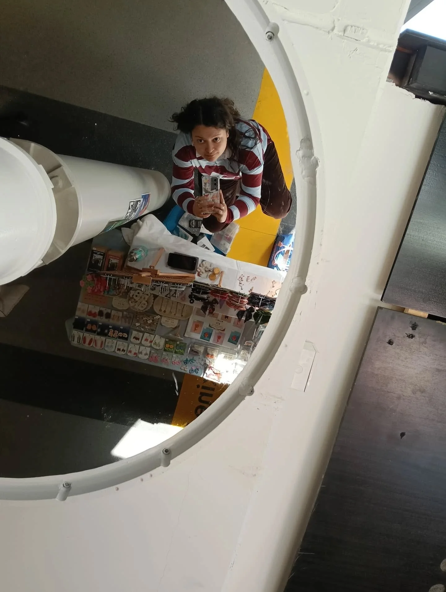 We've been puzzling over why there's a mirror up there. 
The earrings are GLOWING in the sun!