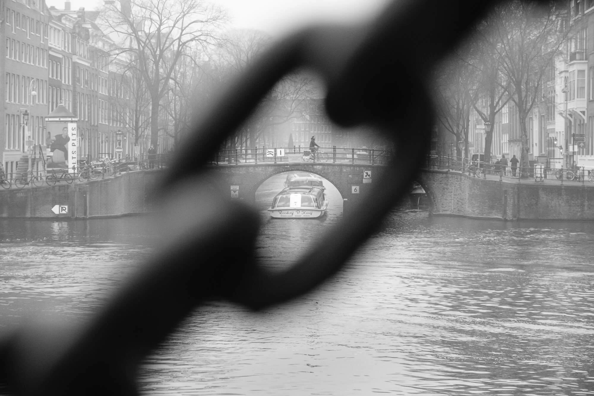 Looking across the Amstel river from the Walter Suskindbrug