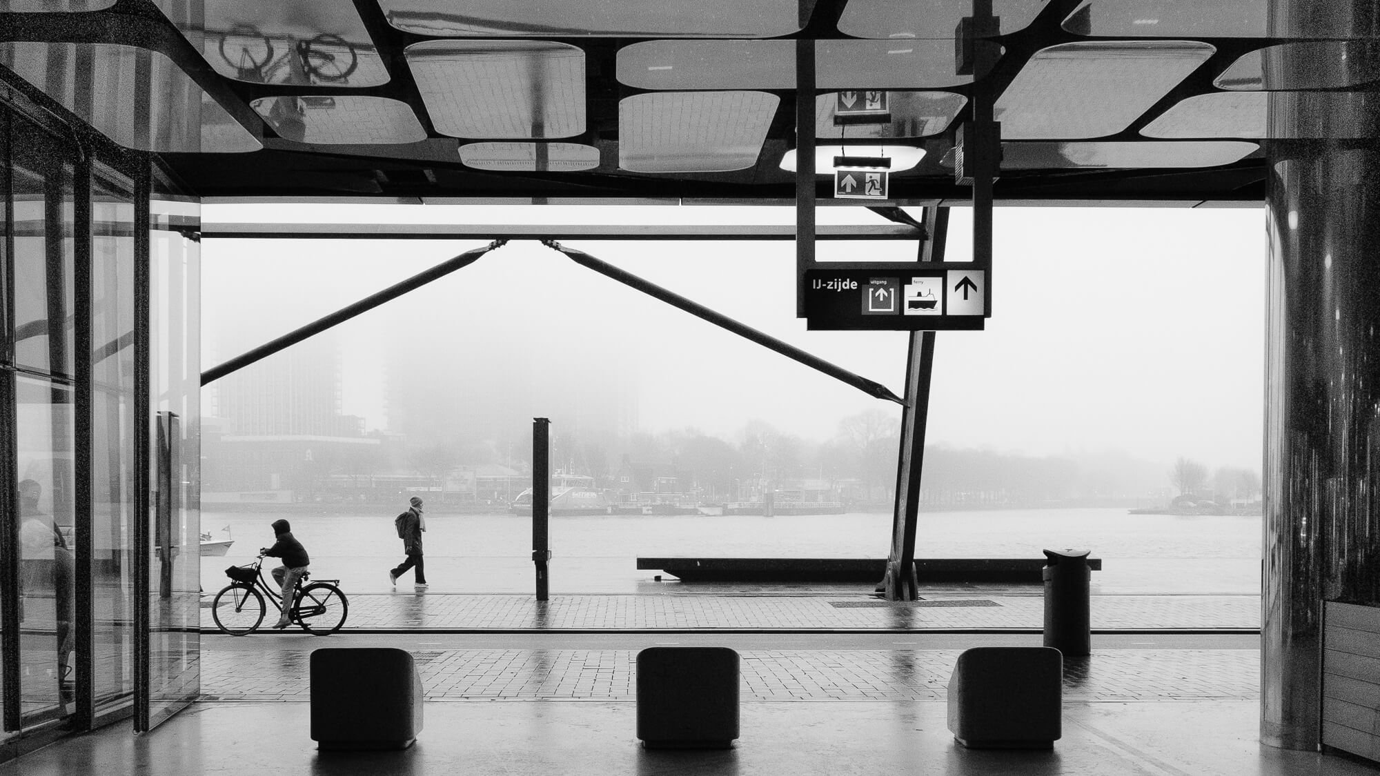 Looking outside from Amsterdam Central on a grey day.