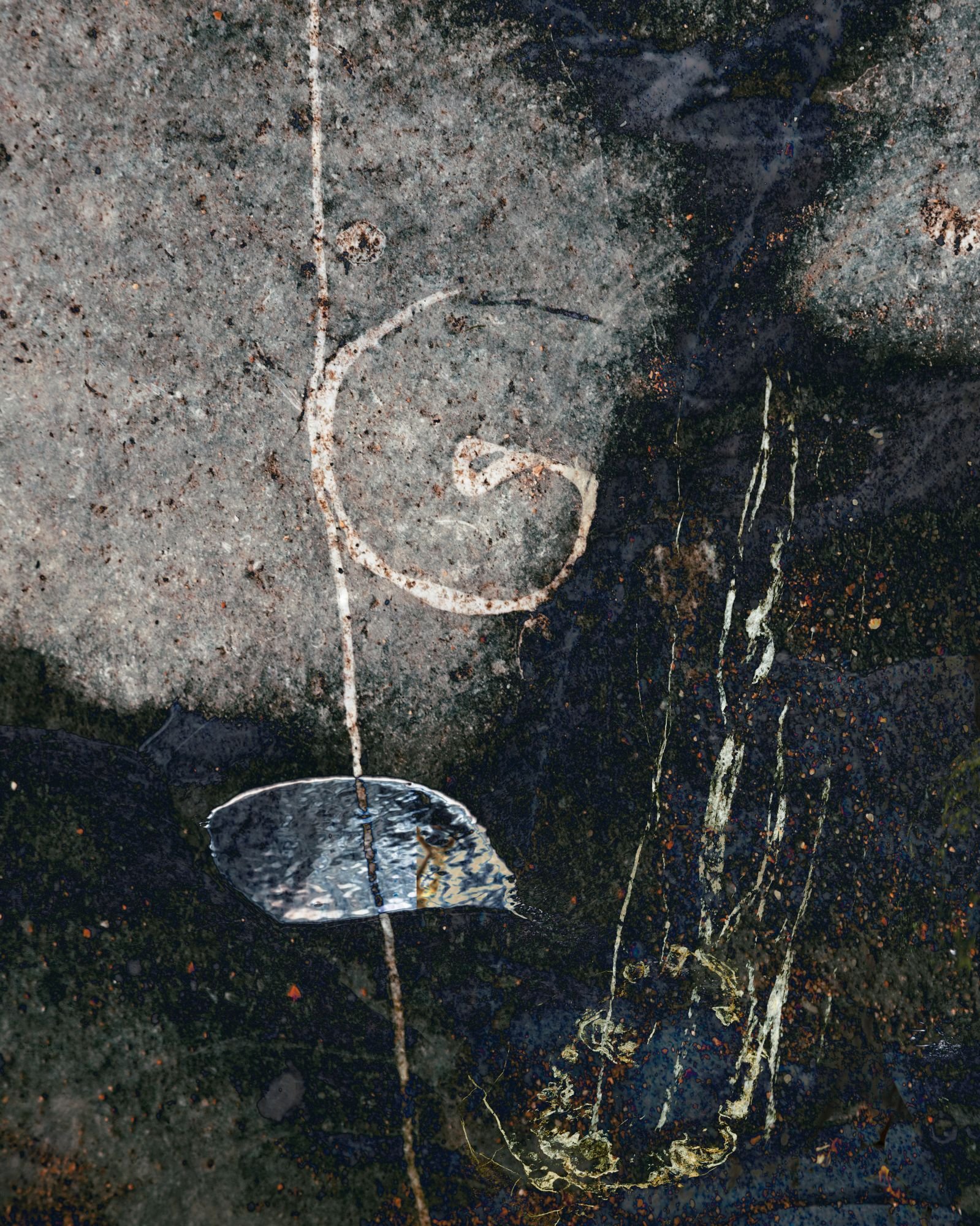 What lies beneath.  Limited edition of 5.  The first image in a project on the Ammonite Pavement in Lyme Regis.  The marks on the stones combine with reflected water and hints of what lies beneath the surface - years of buried fossils and secrets.  T