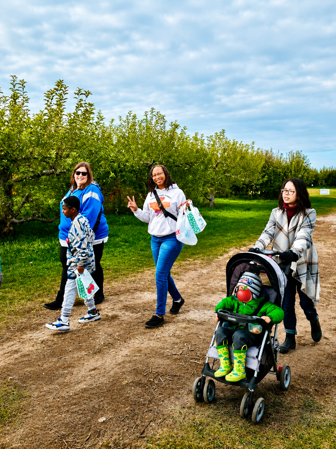 Families and students from the Messy Middle Homeschool Co-op enjoy a community outing at a local apple orchard, creating meaningful connections through inclusive learning and shared experiences