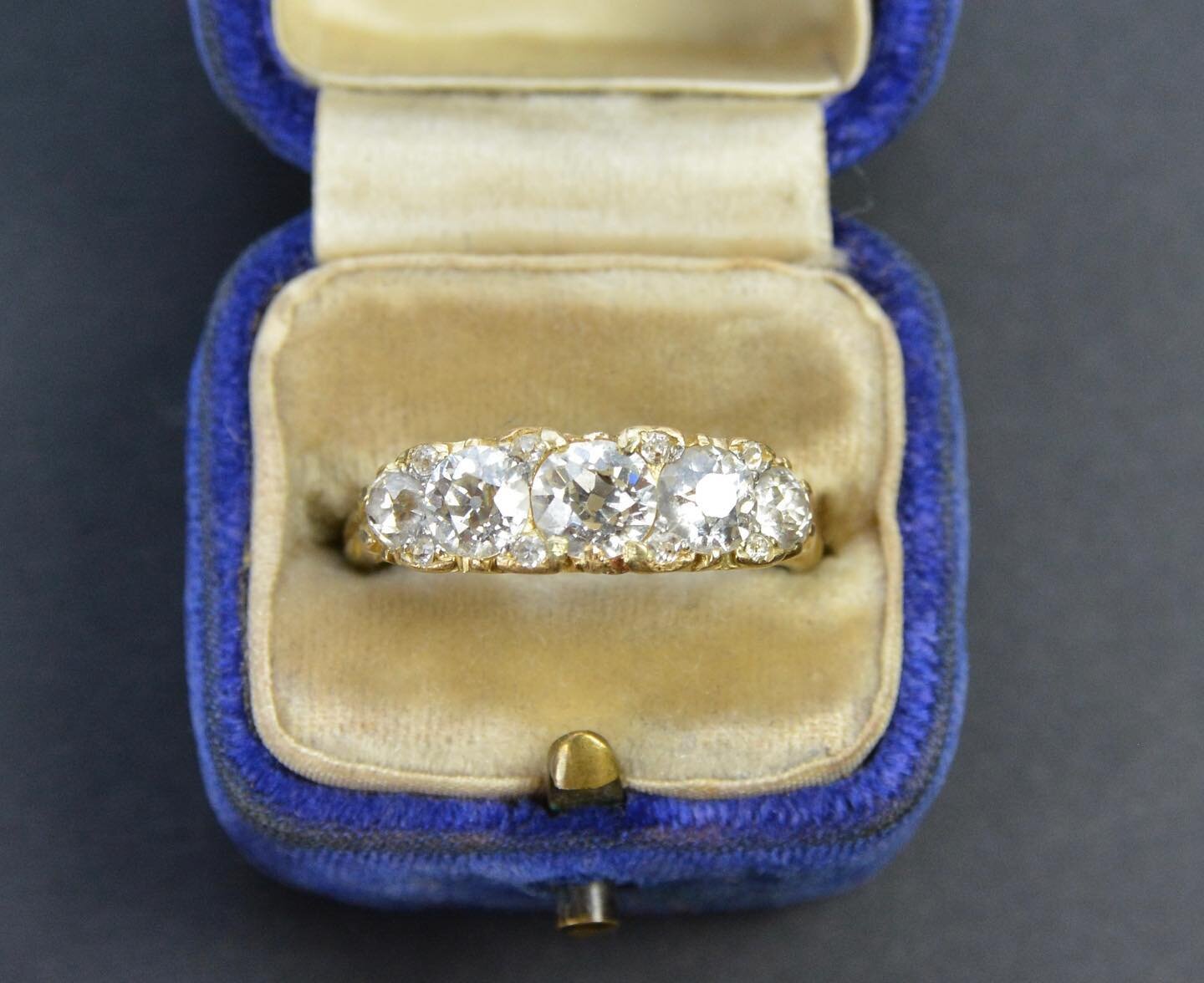A stunning and I mean stunning 5 stone diamond ring, set with beautiful lively old cut diamonds. 

Take a look at the video to see how much these baby&rsquo;s would have sparkles when worn in a room lit by candles (this is when old cuts look there be