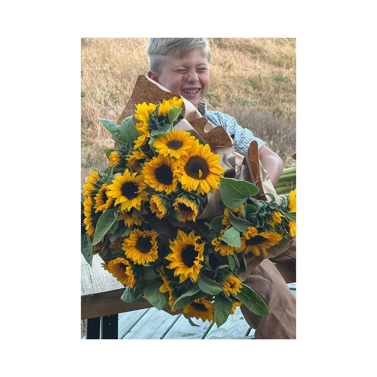 When you&rsquo;re a small family farm everything is all hands on deck. The kids help keep the harvest going by transporting cut blooms to the buckets allowing us to cut faster. They help bunch flowers by separating paper sleeves &amp; putting each st