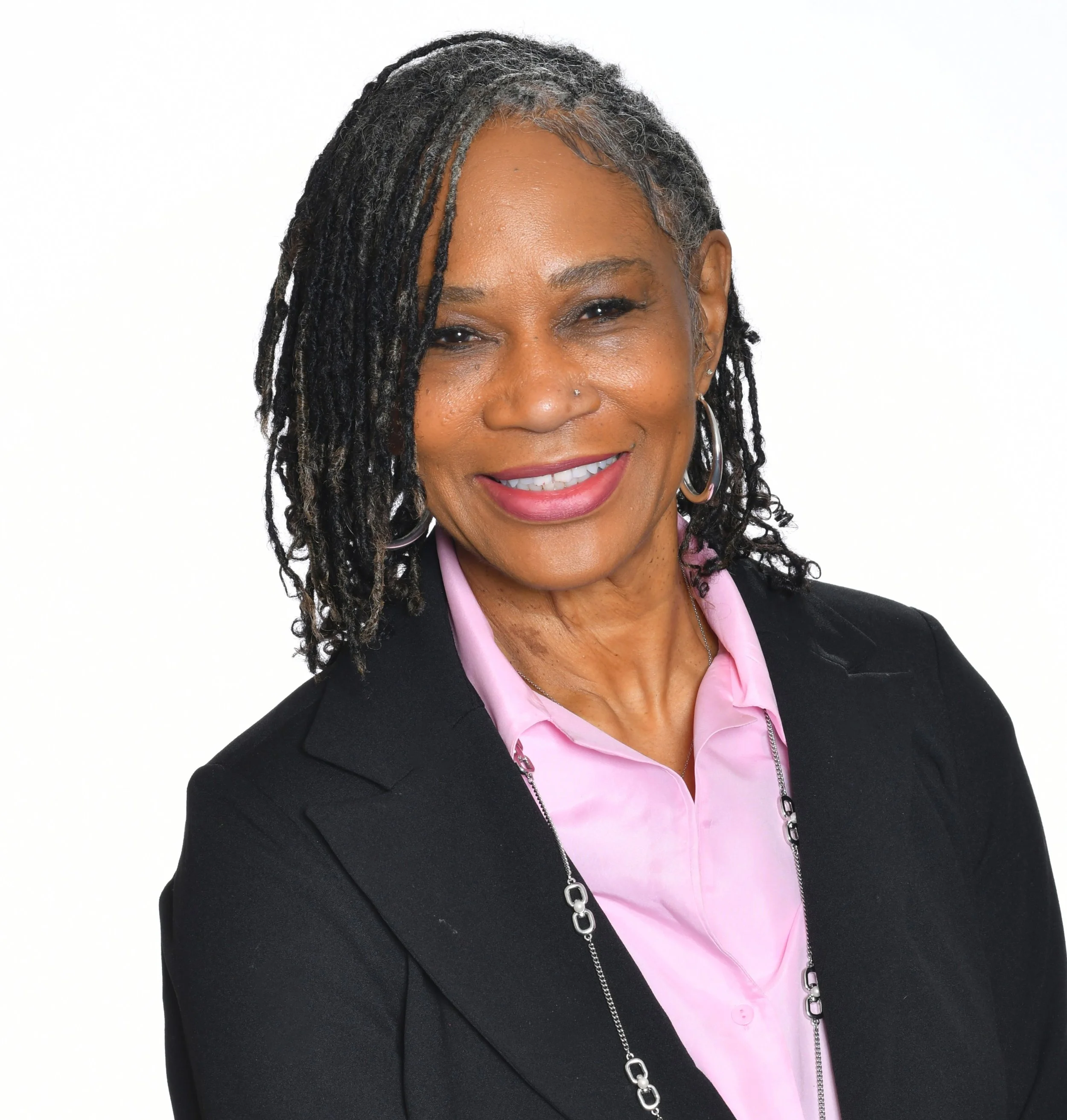 Portrait of Gloria Ratliff, Chief Operations Officer, smiling.