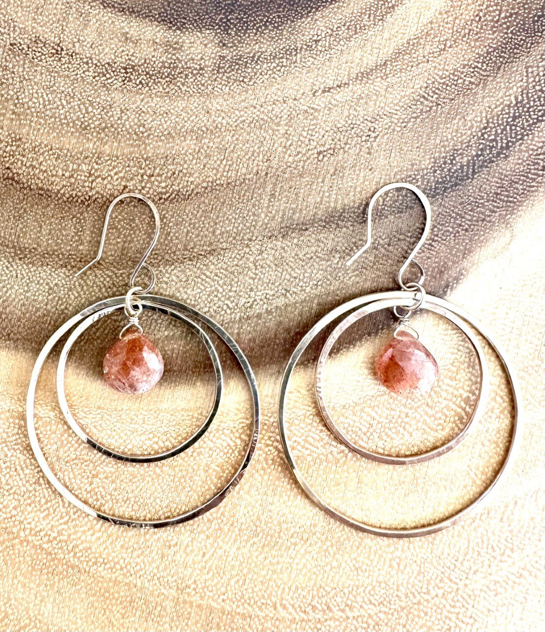 concentric_hoops_gold_labradorite_sunstone_wood.jpg