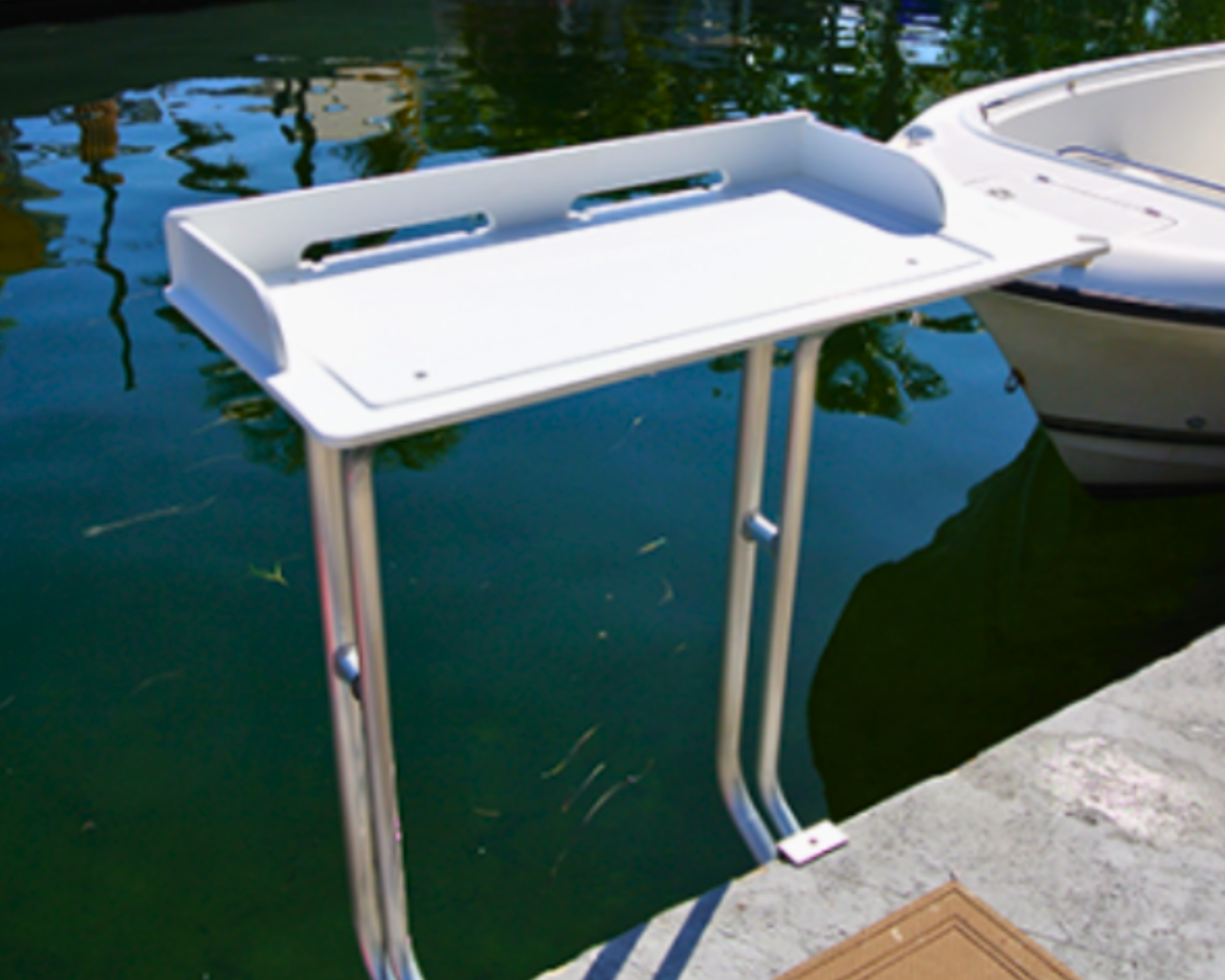 WetSteps fish cleaning station mounted on dock for convenient boat-side fish cleaning by K+R Manufacturing