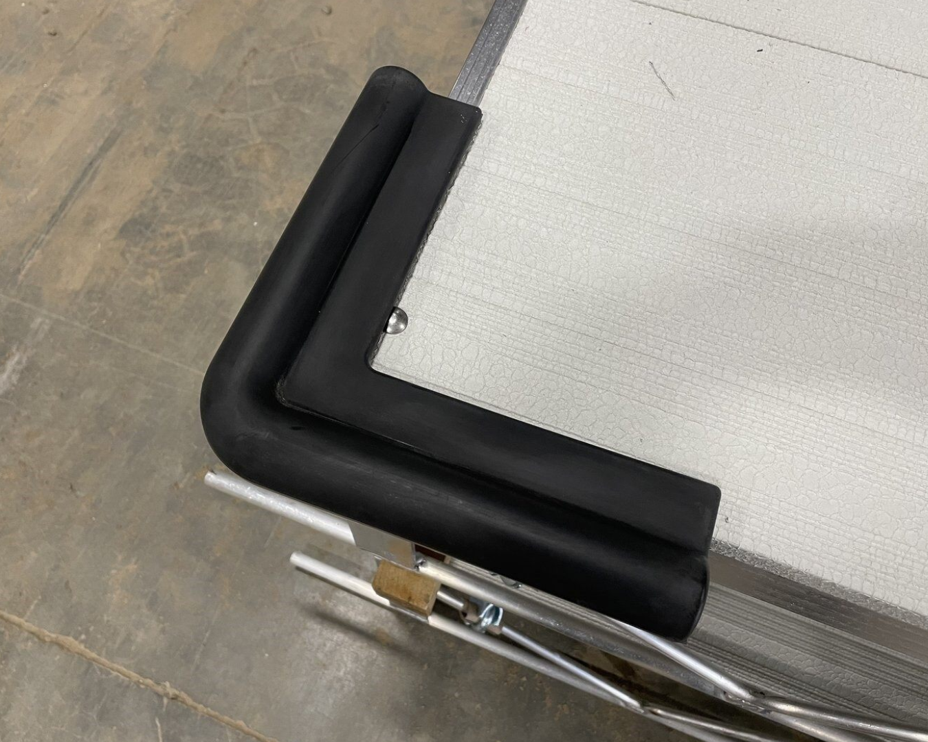 Corner dock bumper installed on dock platform edge for corner impact protection by K+R Manufacturing