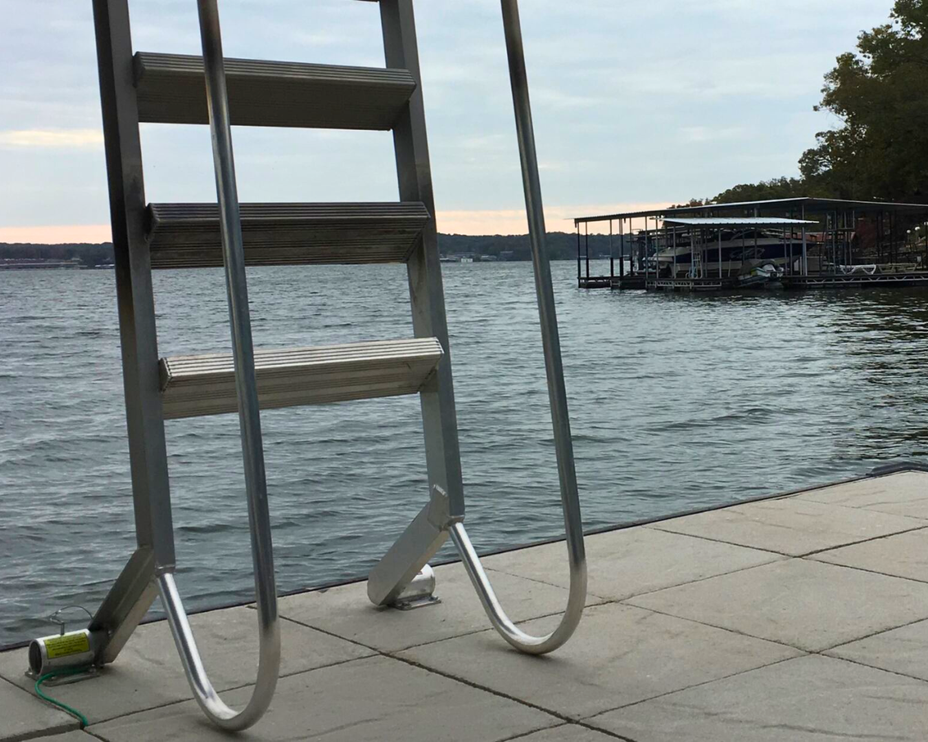 WetSteps bolt-together dock swimming ladder installed on floating dock for safe water access by K+R Manufacturing