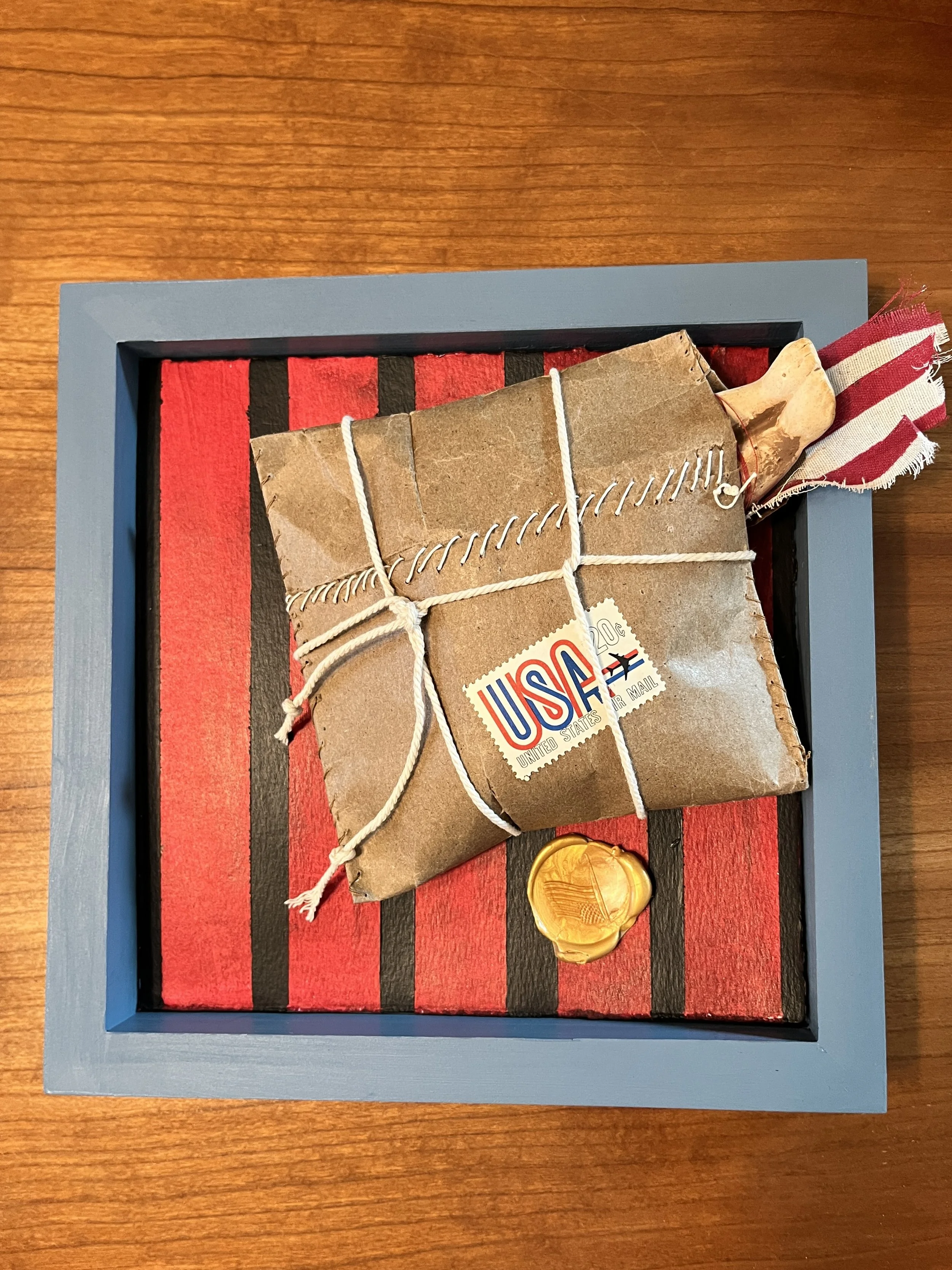 "Leaving Home #2", Mixed Media, paper, wax acrylic, fabric , porcelain in cradled board, 8"x8", 2026