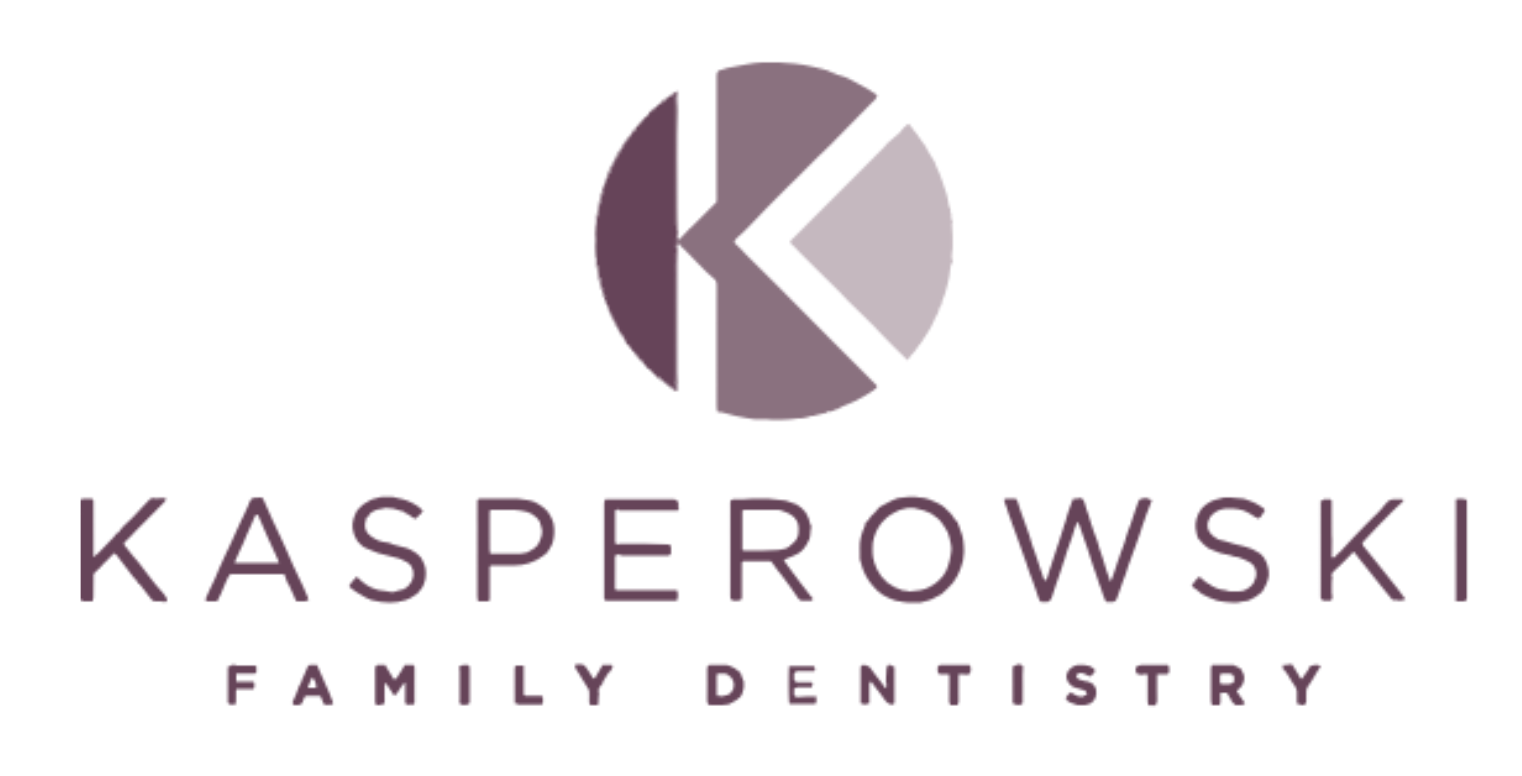 Logo for Kasperowski Family Dentistry featuring a stylized 'K' within a circular design and the text 'Kasperowski Family Dentistry' beneath it.