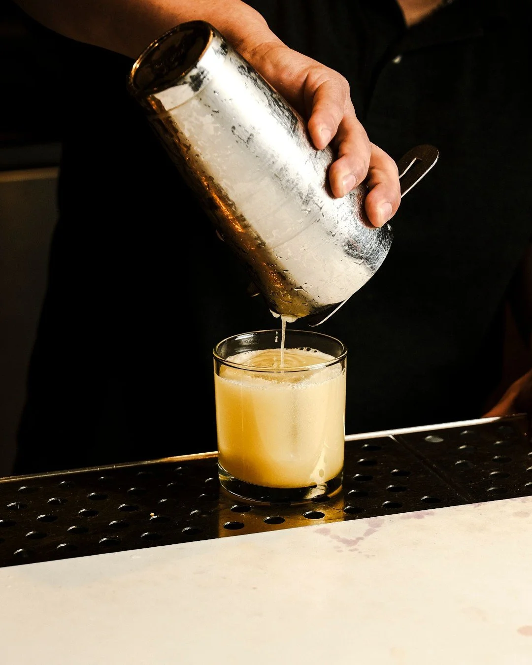 The right pairing makes the meal. A crisp, citrus-forward cocktail alongside a dozen oysters. Something bright and herbaceous next to the catch of the day. At All Water, our drink menu is built to complement the plate, so every bite and every sip wor
