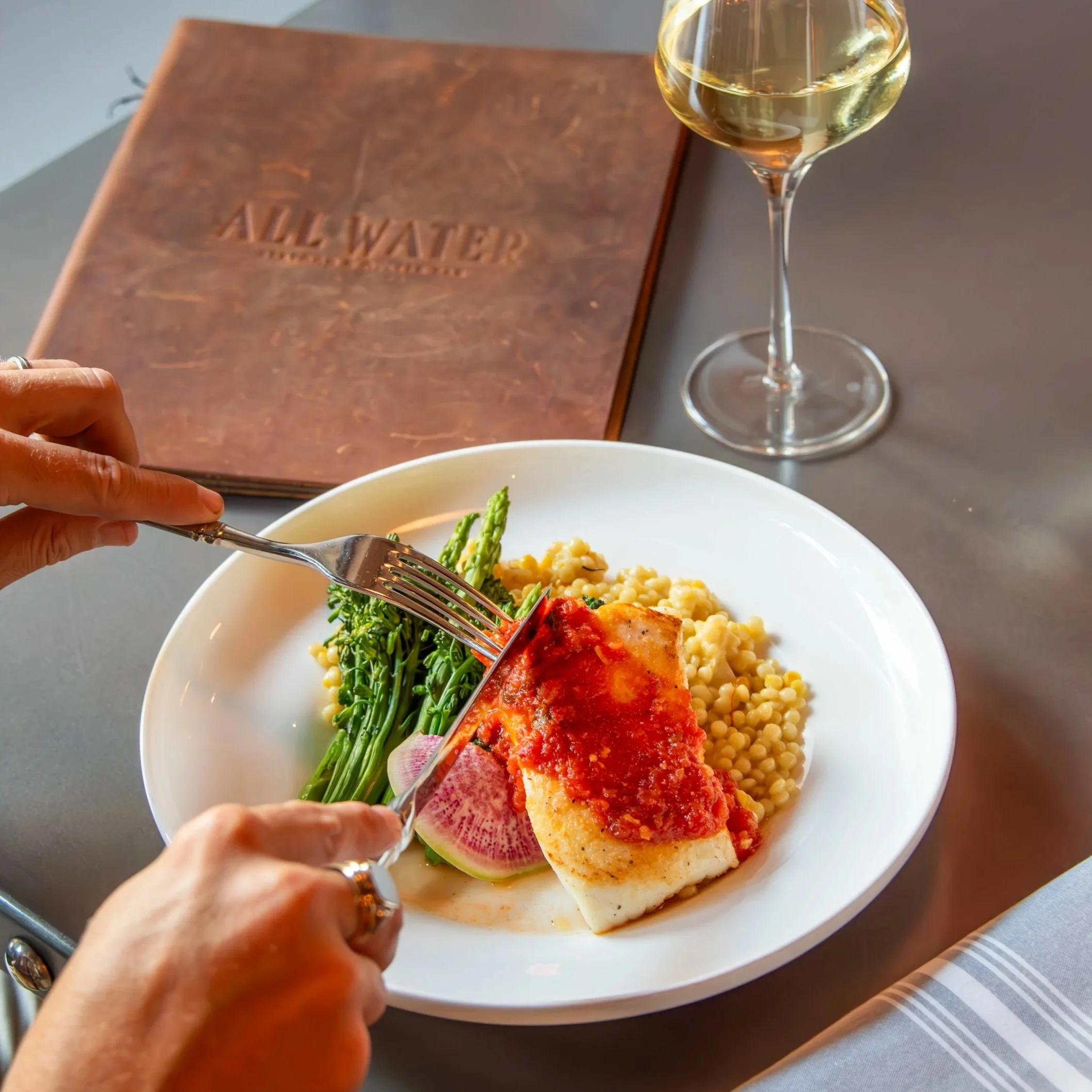 All Water Seafood & Oyster Bar Cod with couscous