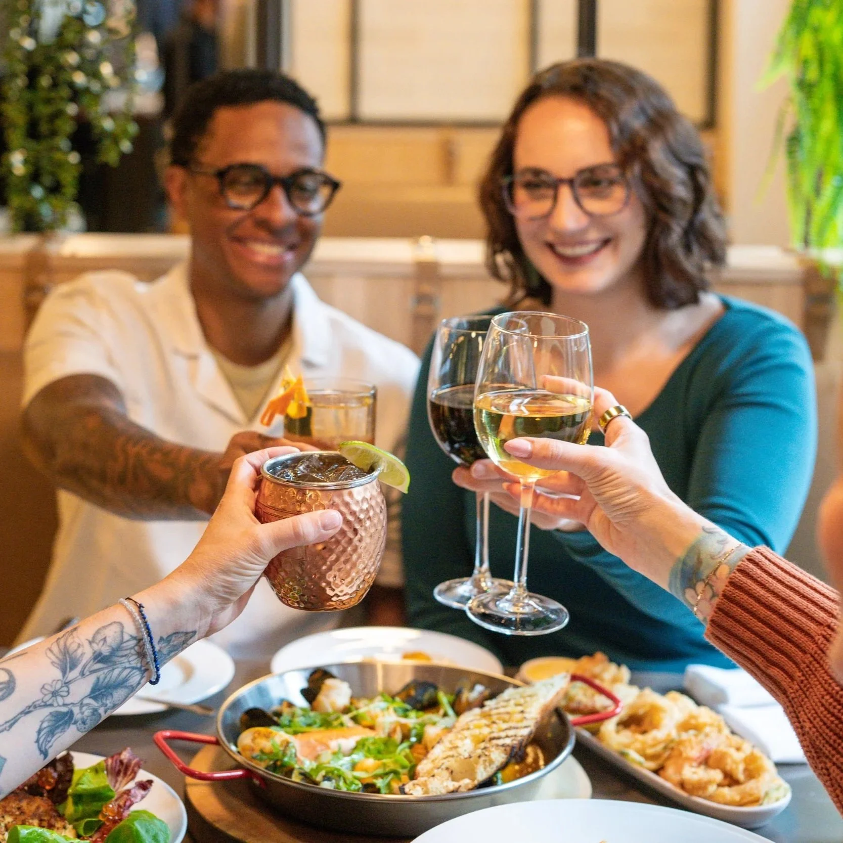 Friends enjoying themselves at All Water Seafood & Oyster Bar 
