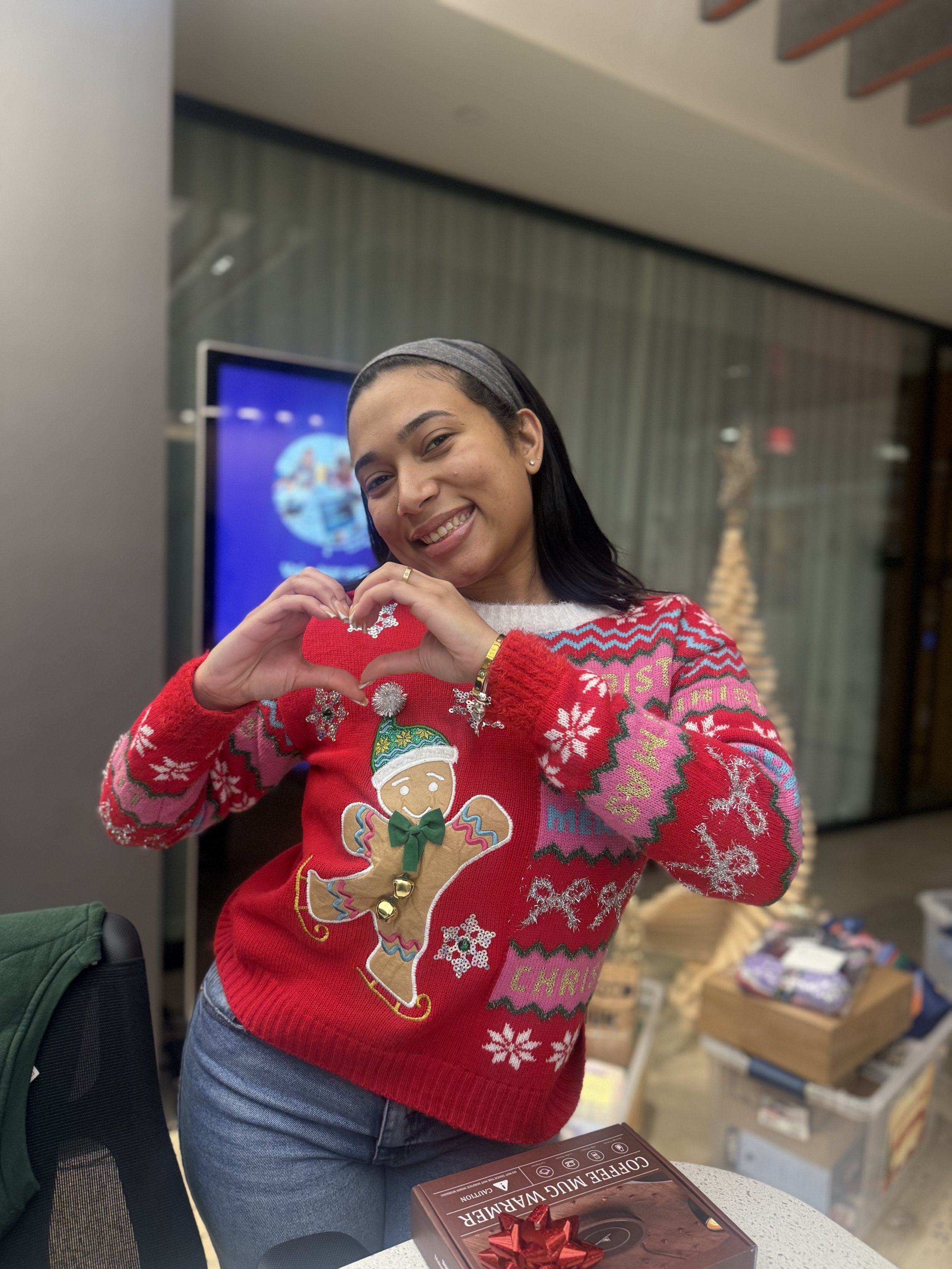 EB - Ugly Sweater Winner with gift.jpg