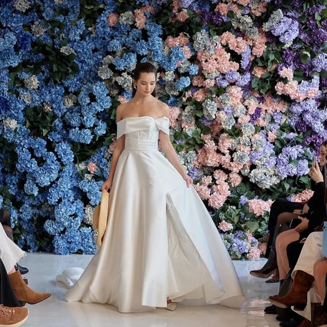 Gorgeous dresses and a wall of hydrangeas by @annebarge Thanks @odapr for teaming up with EDEN. Let&rsquo;s do it again!