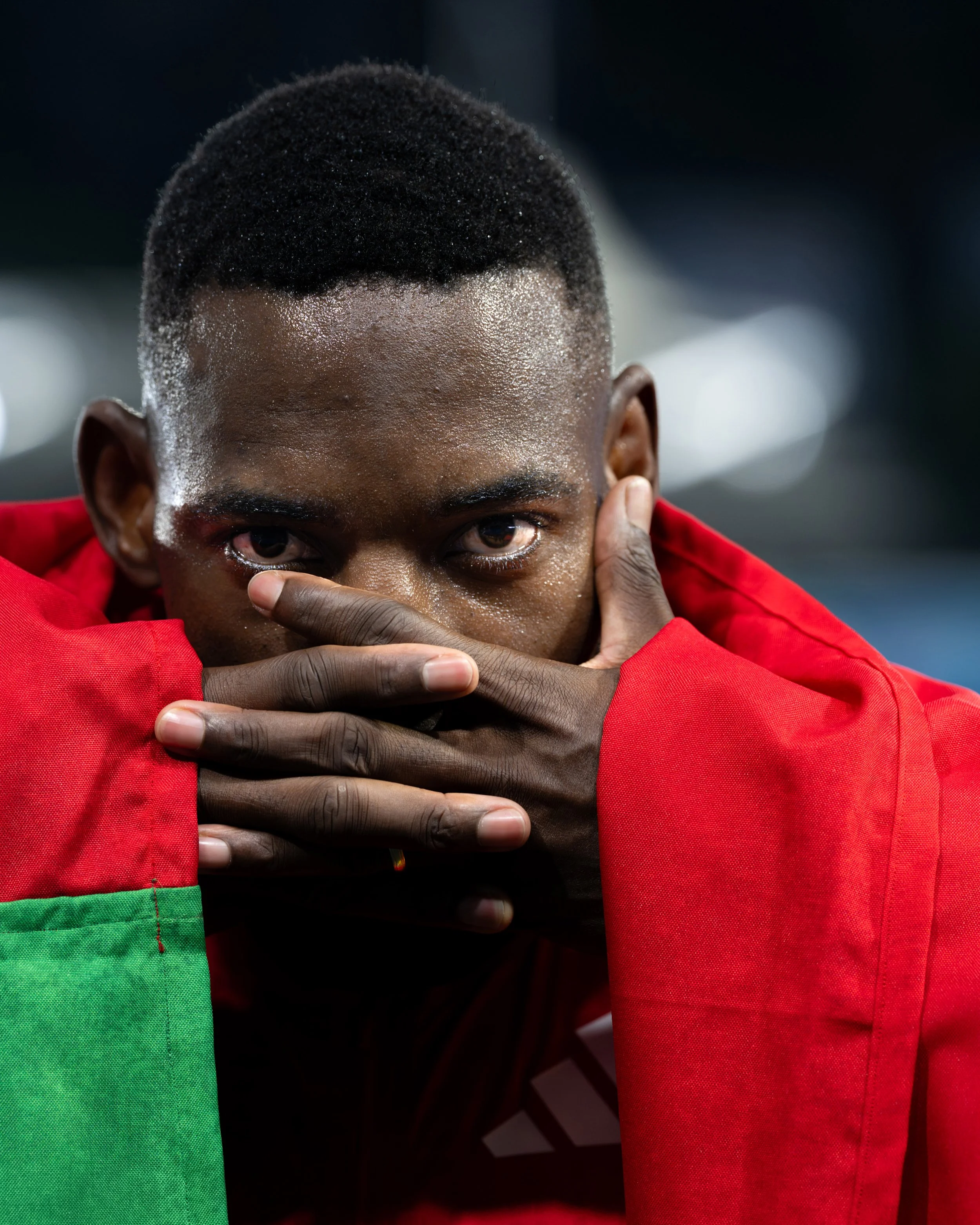  Emmanuel Eseme of Cameroon celebrates winning gold after competing in the Athletics, Men's 100m Final, on day five of the Glasgow 2026 Commonwealth Games at Scotstoun Stadium on July 28, 2026 in Glasgow, Scotland. Photo by: Patrick Khachfe / Onside 