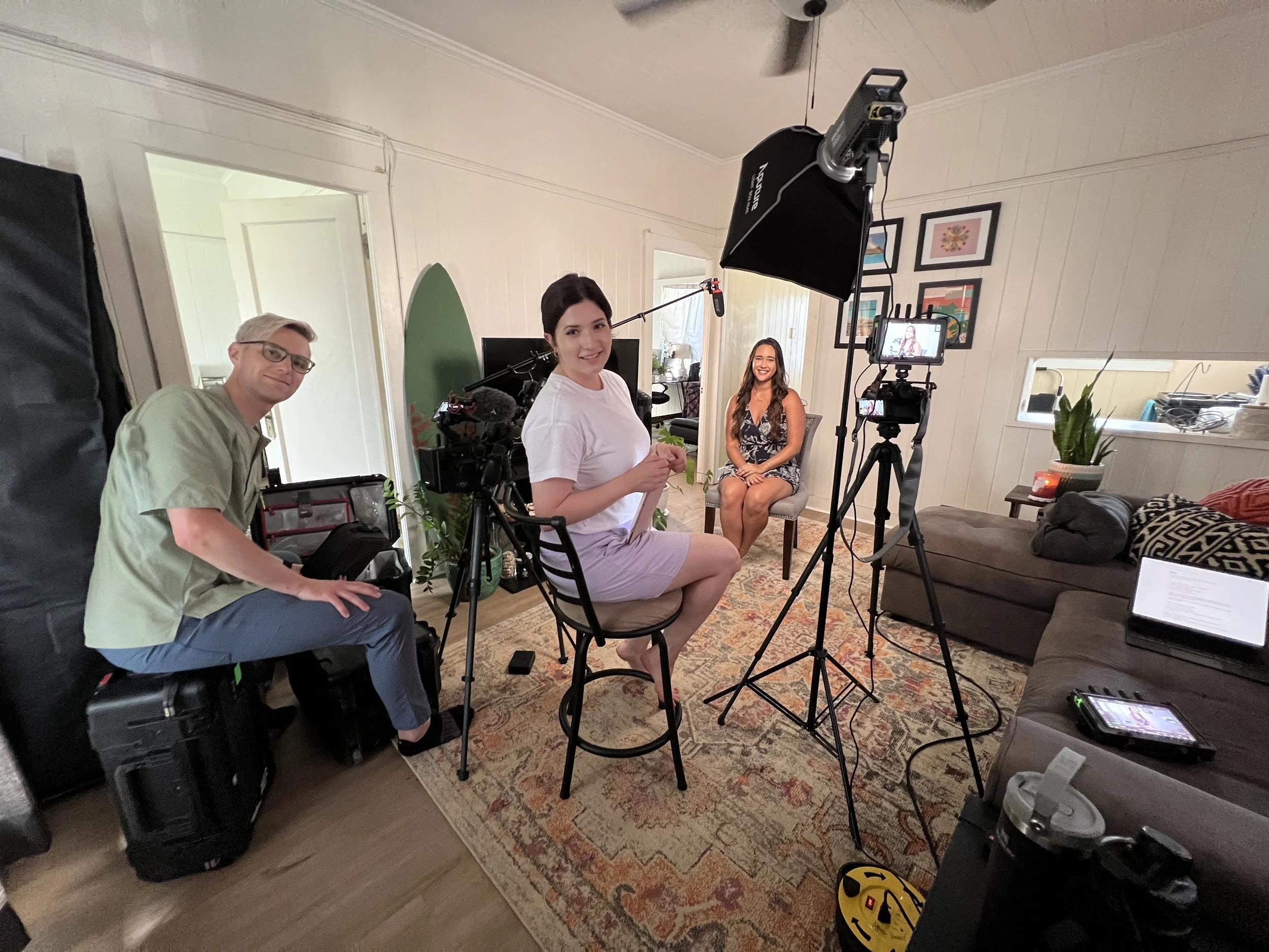 Behind the scenes: crew filming a living room interview in Hawaii for Priced Out of Paradise, directed by Annie and Sam Menendez