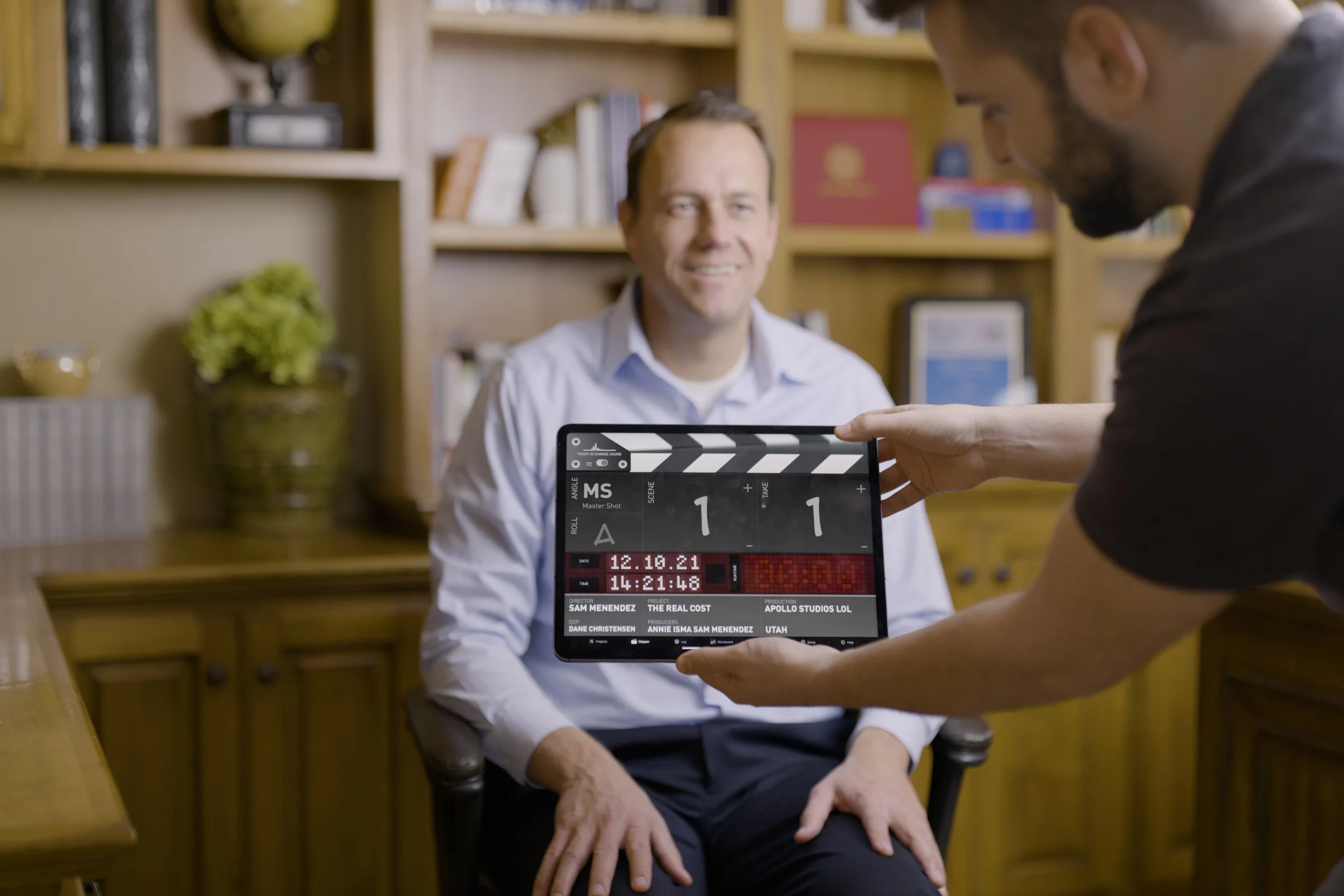 Taylor Nadauld slated before his interview. Behind the scenes of The Real Cost, a student debt documentary directed by Sam Menendez and produced by Annie Menendez