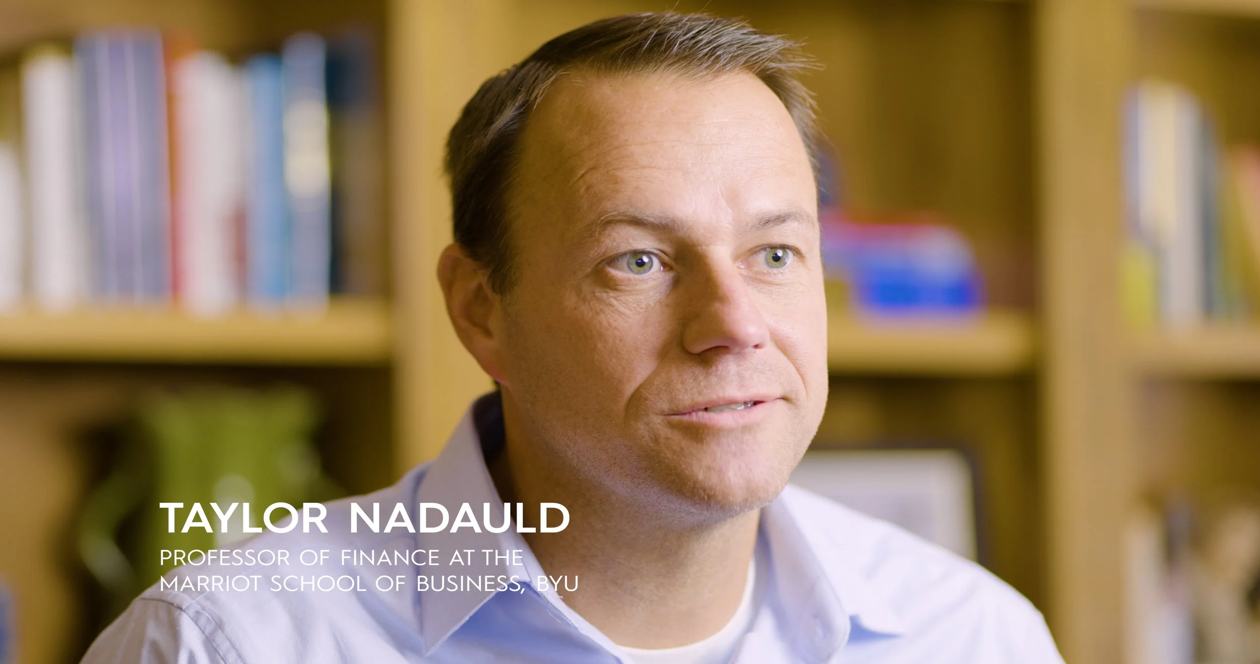 Taylor Nadauld interviewed in a home office. Still from The Real Cost, a student debt documentary directed by Sam Menendez and produced by Annie Menendez
