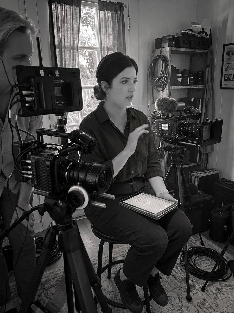 Annie Menendez, executive producer, on set directing an interview for an Apollo Studios documentary