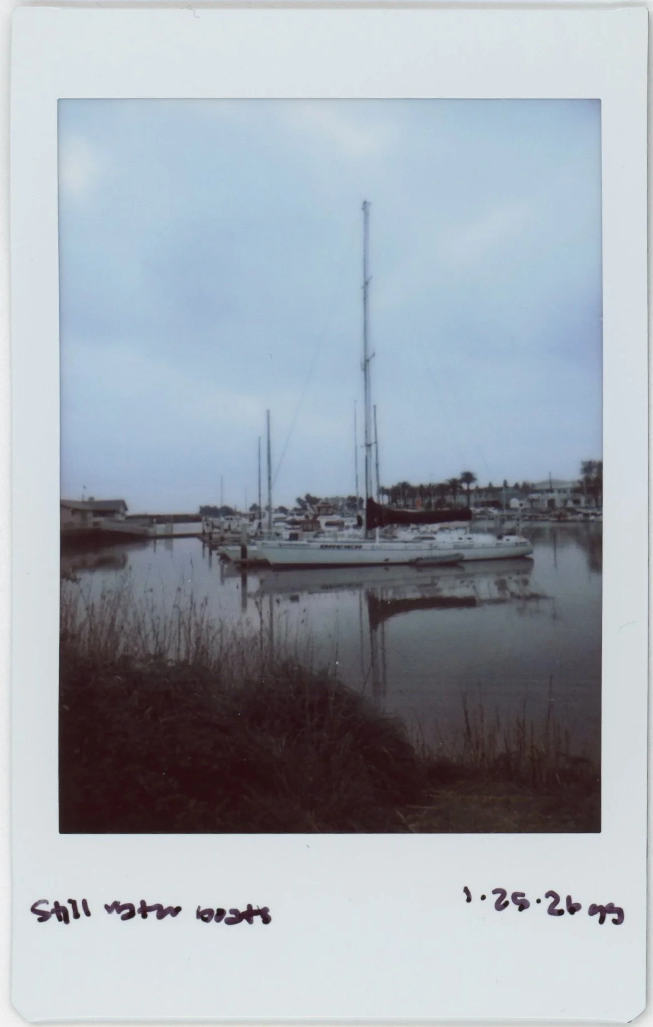 Jan Instax 0125 still water boats.jpg