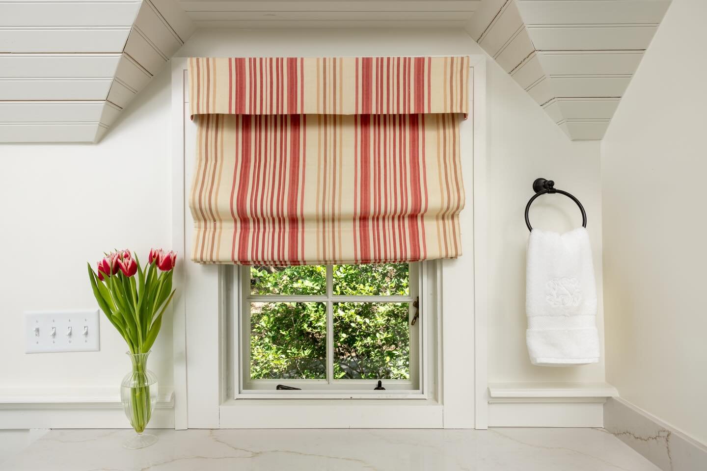 A gorgeous Roman Shade revitalizes a room. We love the classic stripe our clients chose for their historic cottage!